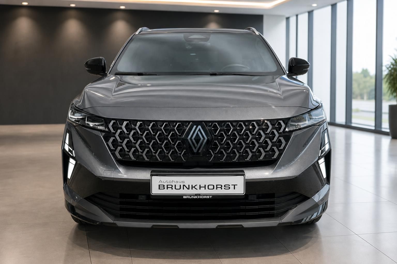 Renault Austral Frontansicht mit markantem Kühlergrill in Grau
