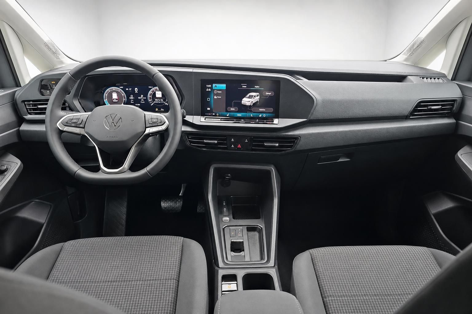 VW Caddy Cockpit mit Lenkrad und Infotainment-Display