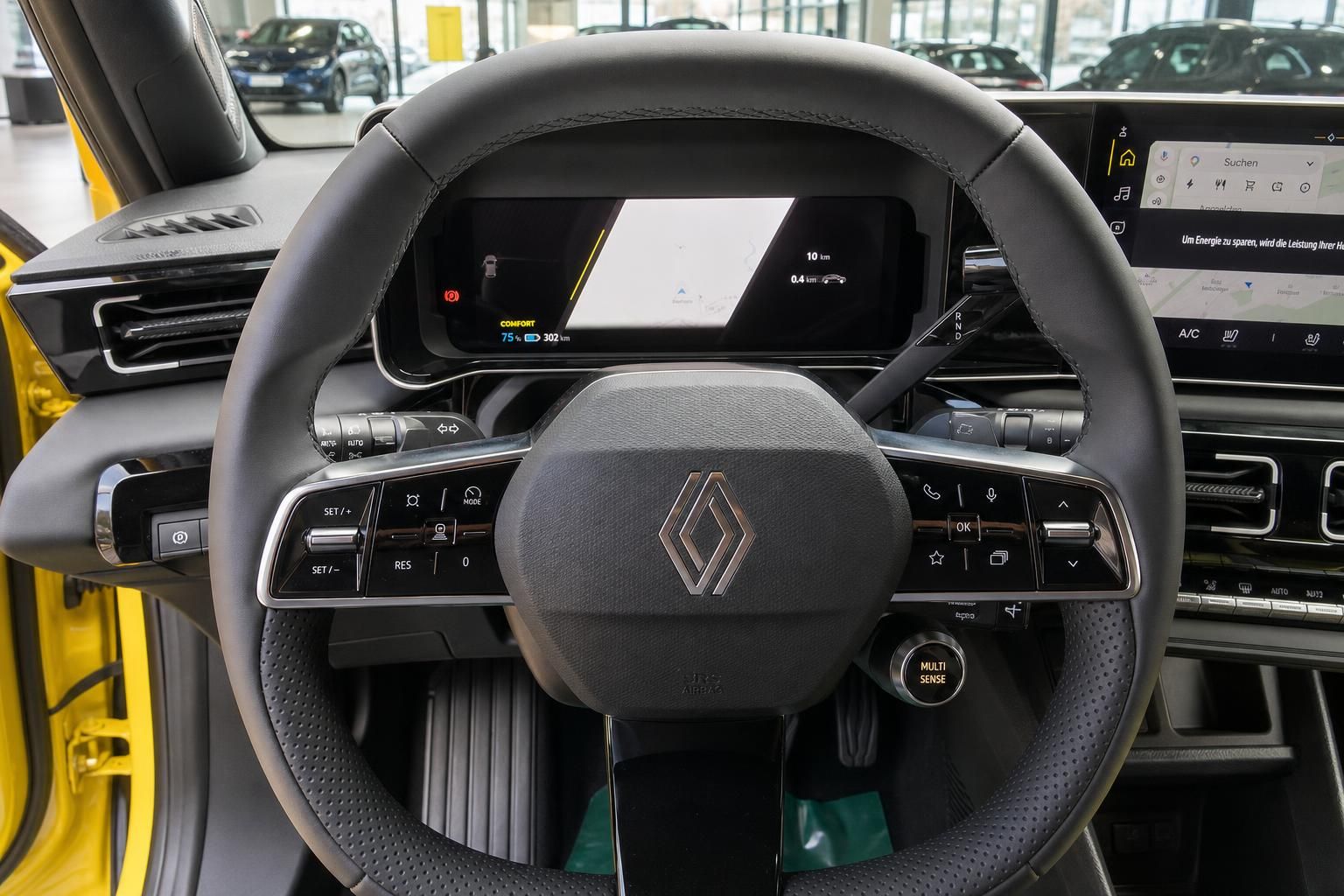 Renault 5 Lenkrad mit digitalem Kombiinstrument und Navigationsanzeige