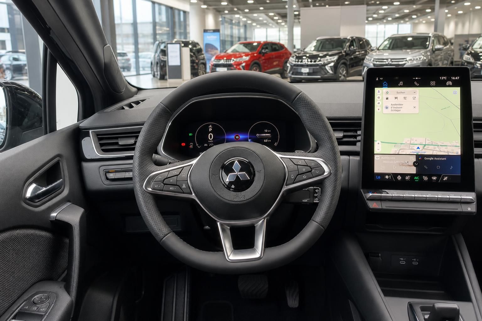Fahrzeug-Innenraum mit Lenkrad, Armaturenbrett und großem Touchscreen-Display im modernen Design