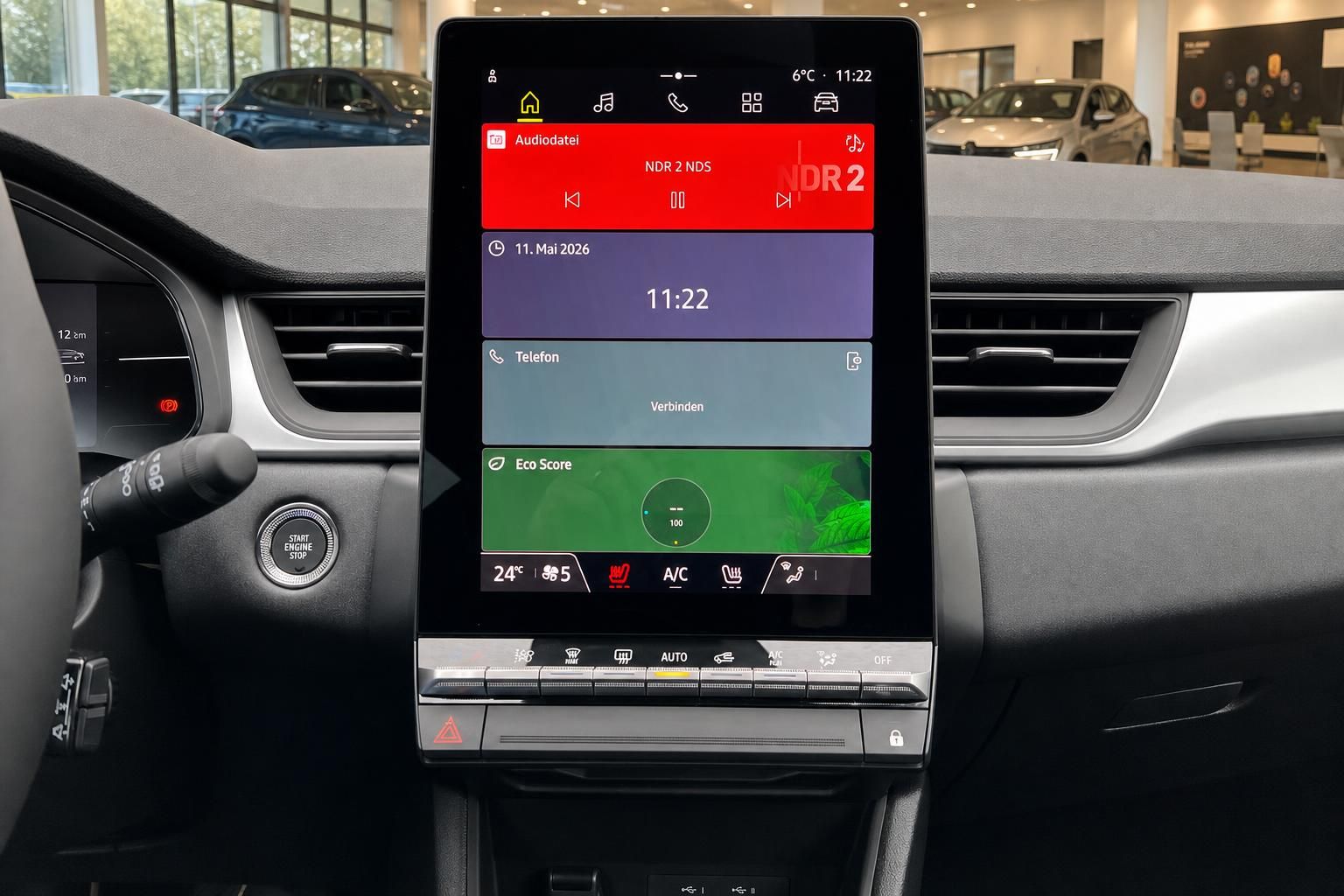 Renault Touchscreen-Display mit Multimedia-System und Klimasteuerung im Innenraum