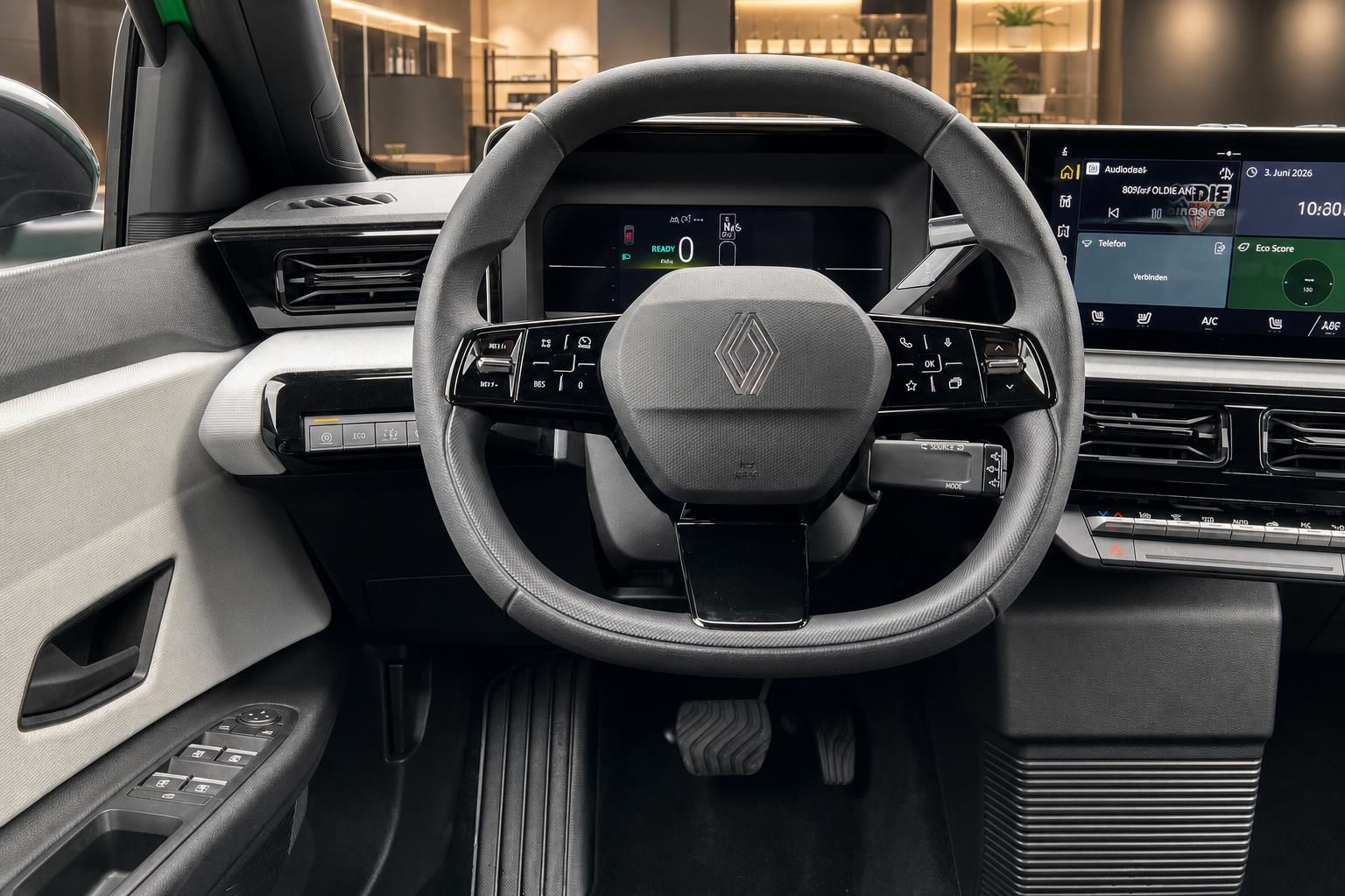 Renault Lenkrad mit digitalen Anzeigen und modernem Cockpit Design