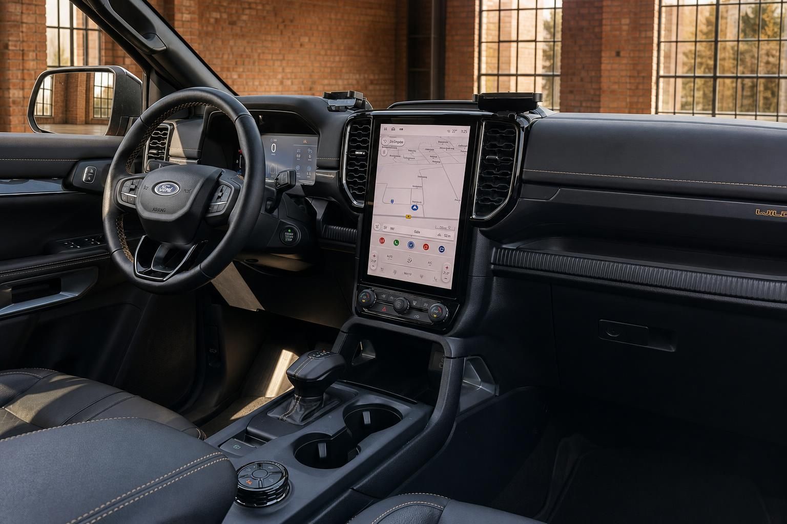 Ford Ranger Wildtrak Cockpit mit großem Touchscreen-Infotainment und Ford-Lenkrad