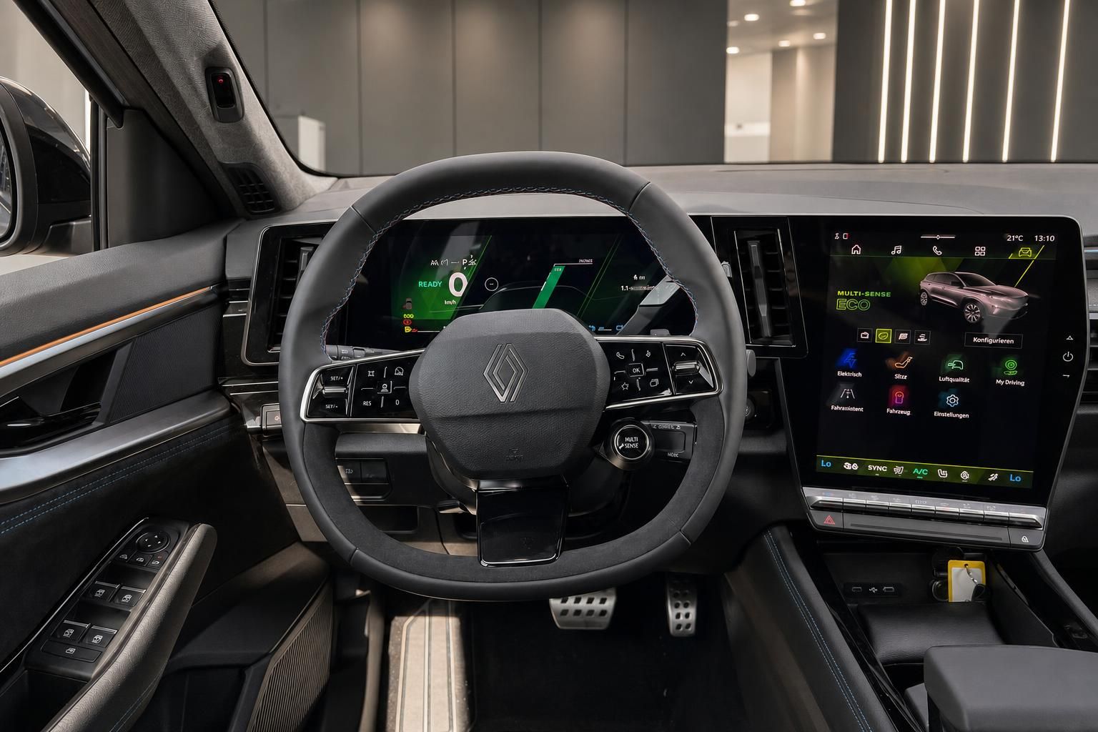 Cockpit mit Lenkrad und Digitaldisplay im Fahrzeuginnenraum