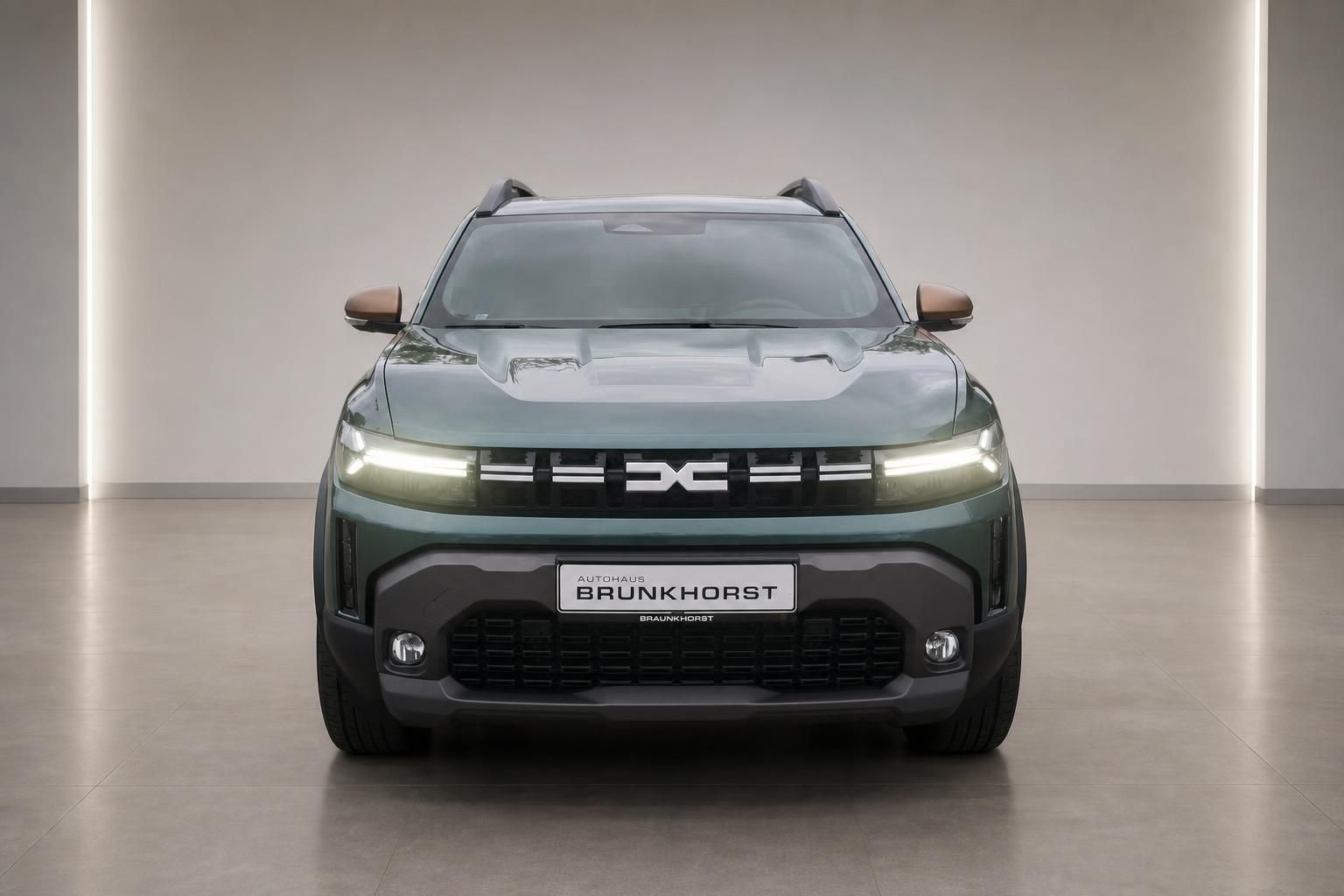 Dacia Duster grün Frontansicht mit LED-Scheinwerfern