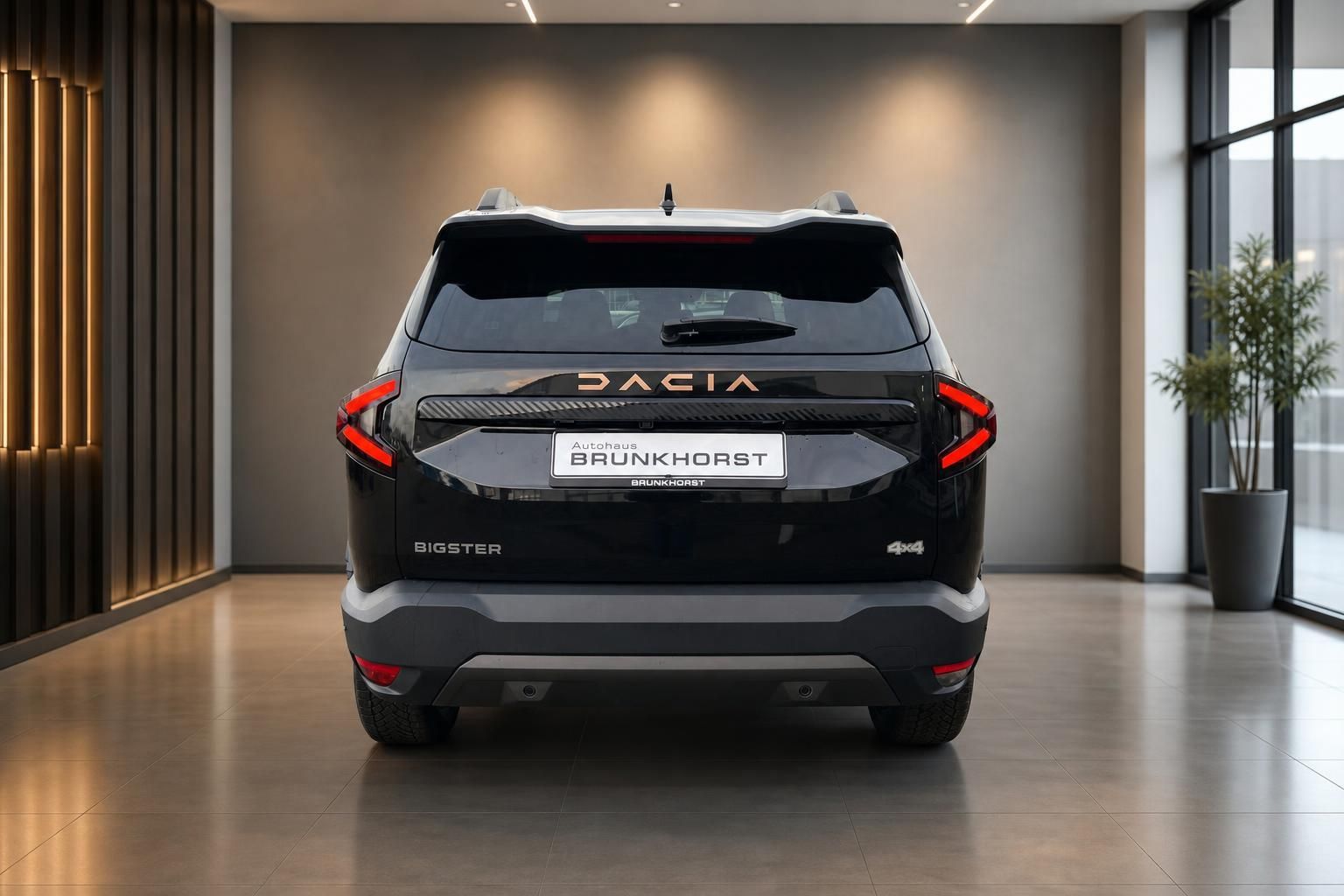 Dacia Bigster Heckansicht in grau-schwarz mit Autohaus Brunkhorst Kennzeichen