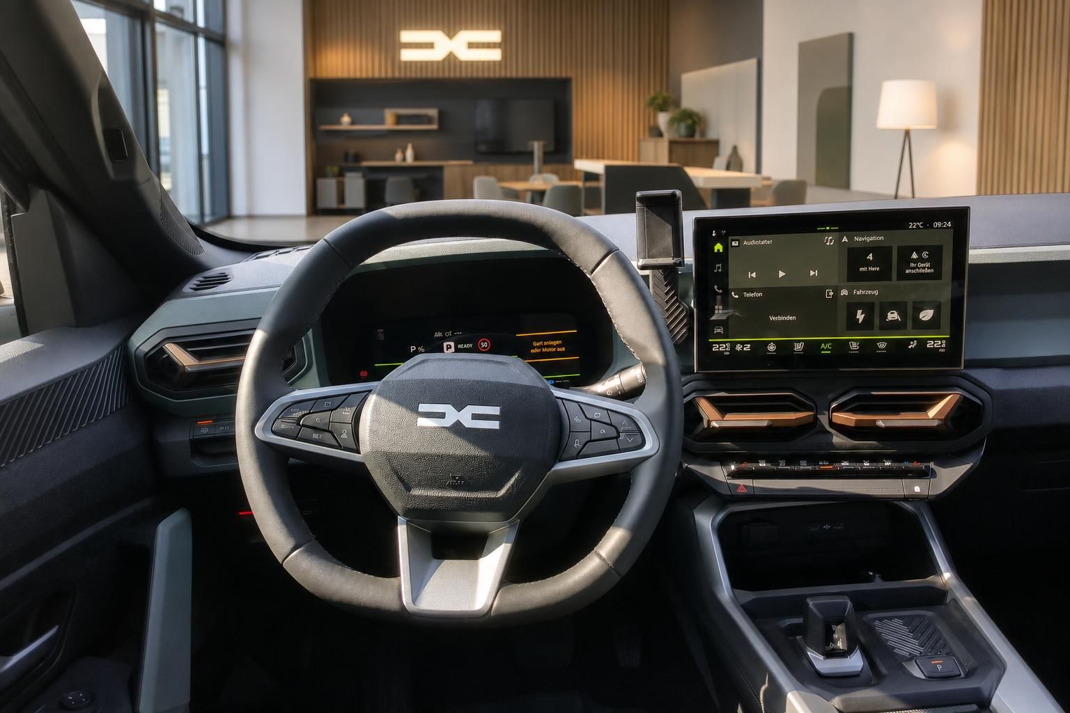 Cockpit mit Lenkrad und Touchscreen-Infotainmentsystem im Neuwagen