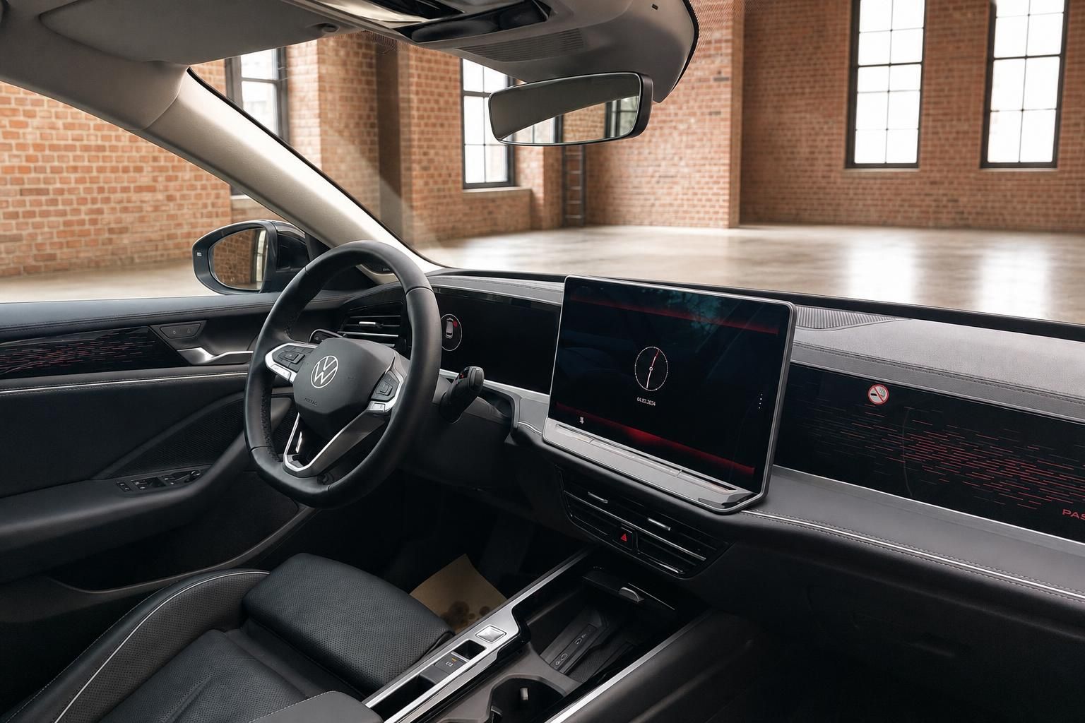 VW Passat Fahrerbereich mit Lenkrad und großem Infotainment-Display