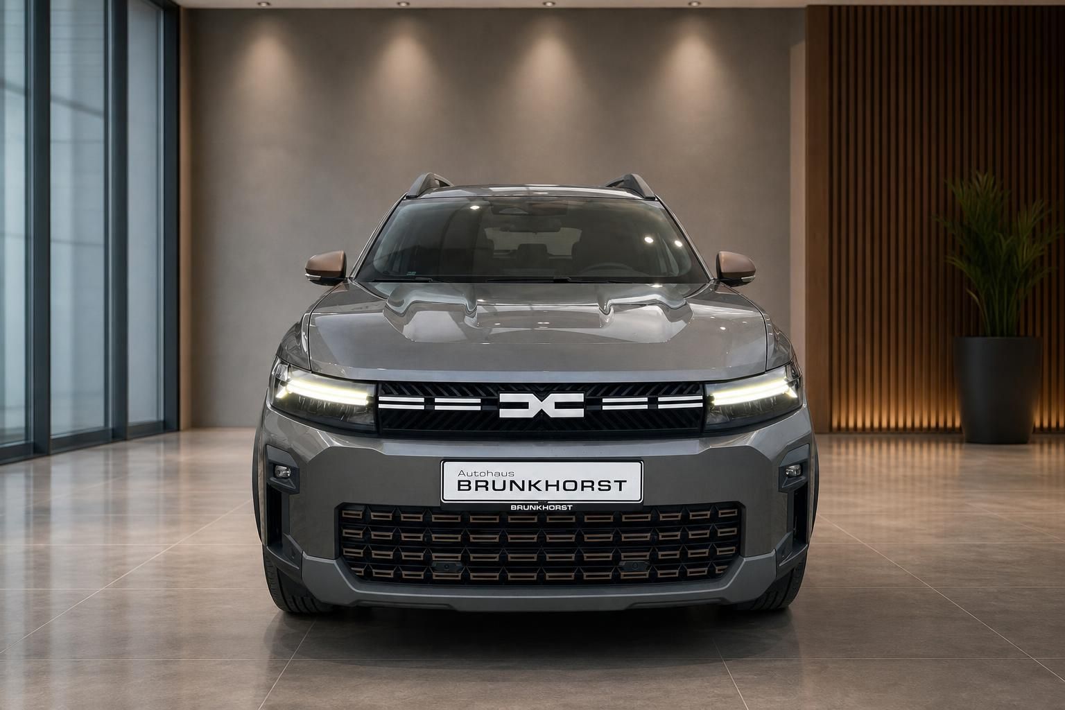 Dacia Bigster SUV in grau - Frontansicht mit charakteristischem Kühlergrill
