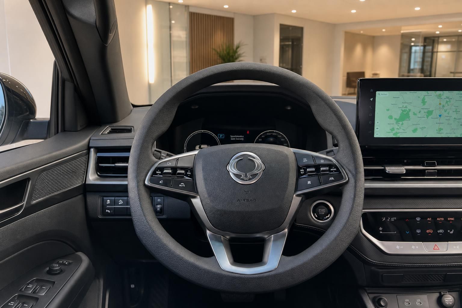 Fahrzeug Cockpit mit Lenkrad und Infotainment-Display - Innenraum Detailansicht