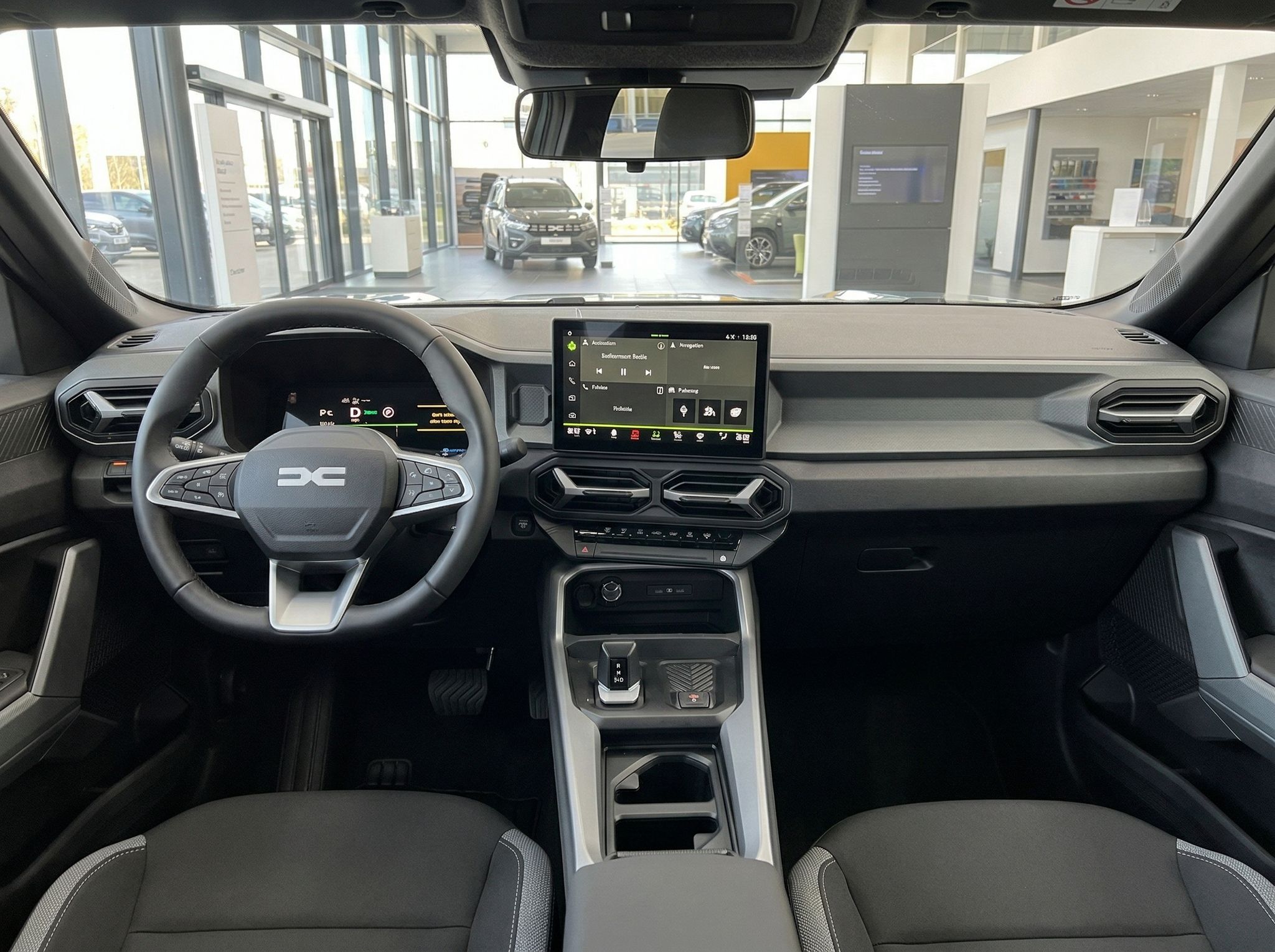 Modernes Fahrzeug-Cockpit mit digitalem Display und Lenkrad - Innenraumansicht