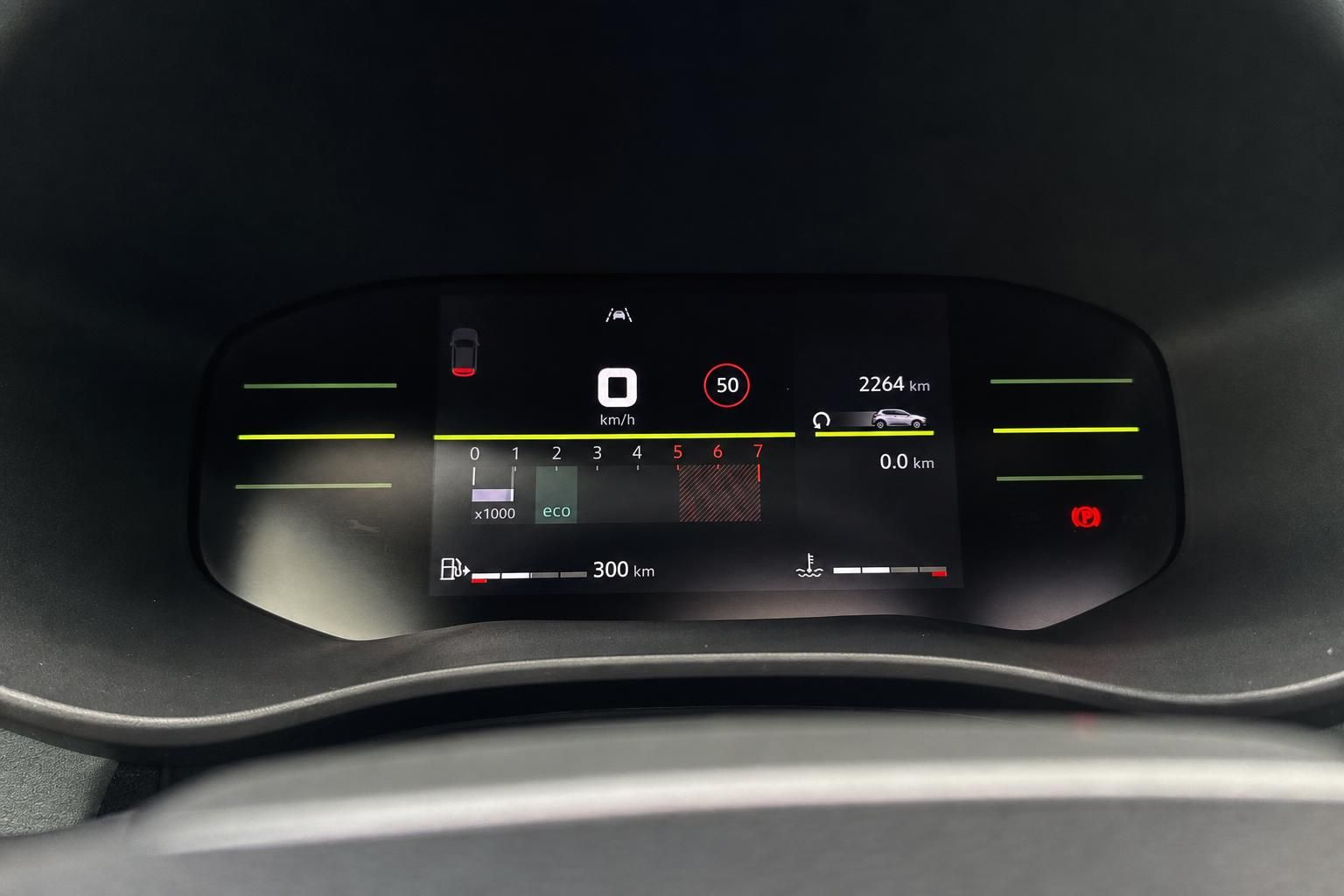 Digitales Kombiinstrument mit Geschwindigkeitsanzeige und Reichweitenanzeige im modernen Fahrzeug-Cockpit