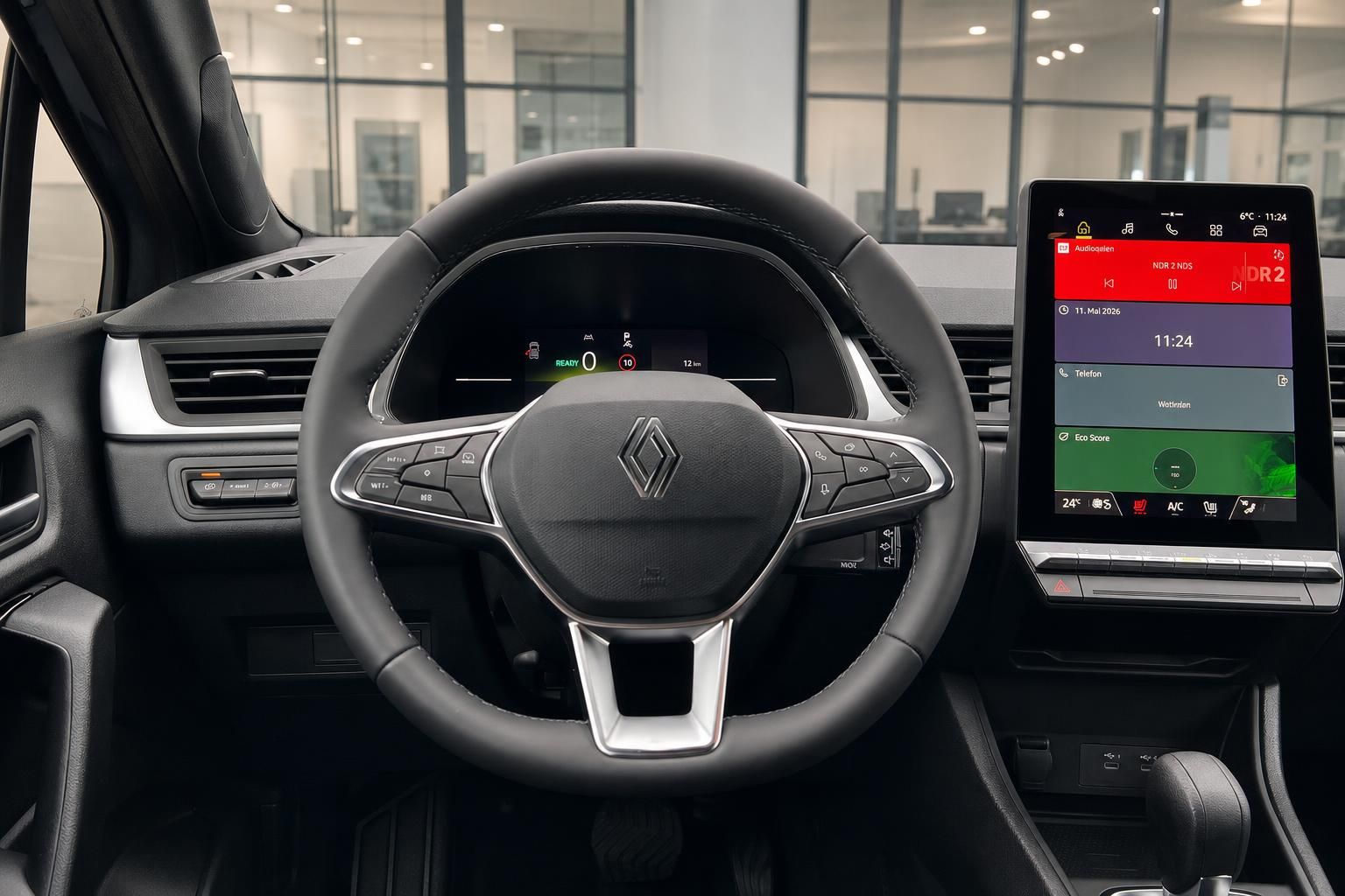 Renault Cockpit mit Lenkrad, digitalem Kombiinstrument und Touchscreen-Infotainmentsystem