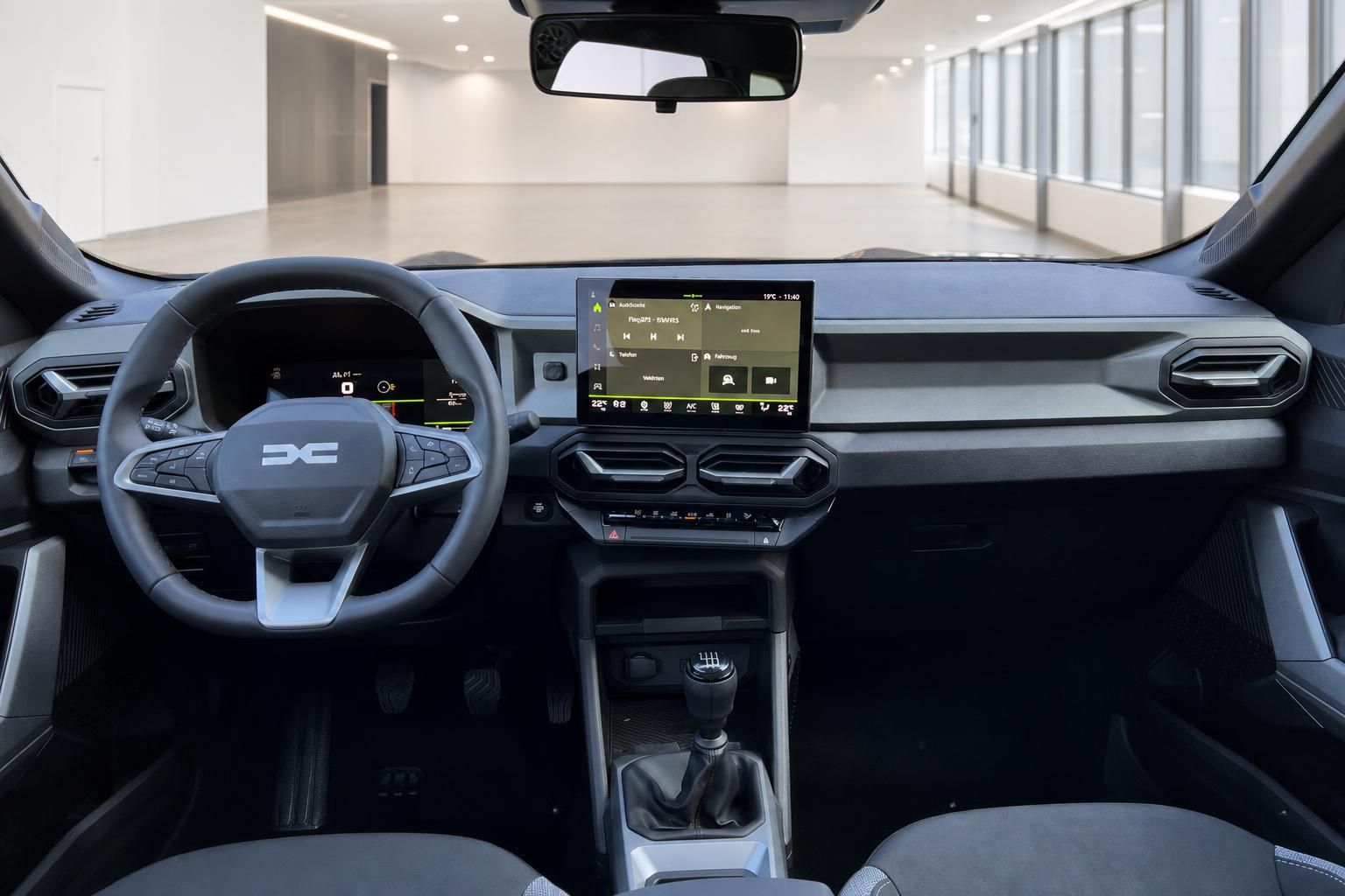 Dacia Bigster Cockpit mit Lenkrad, Digitaltacho und zentralem Touchscreen-Display