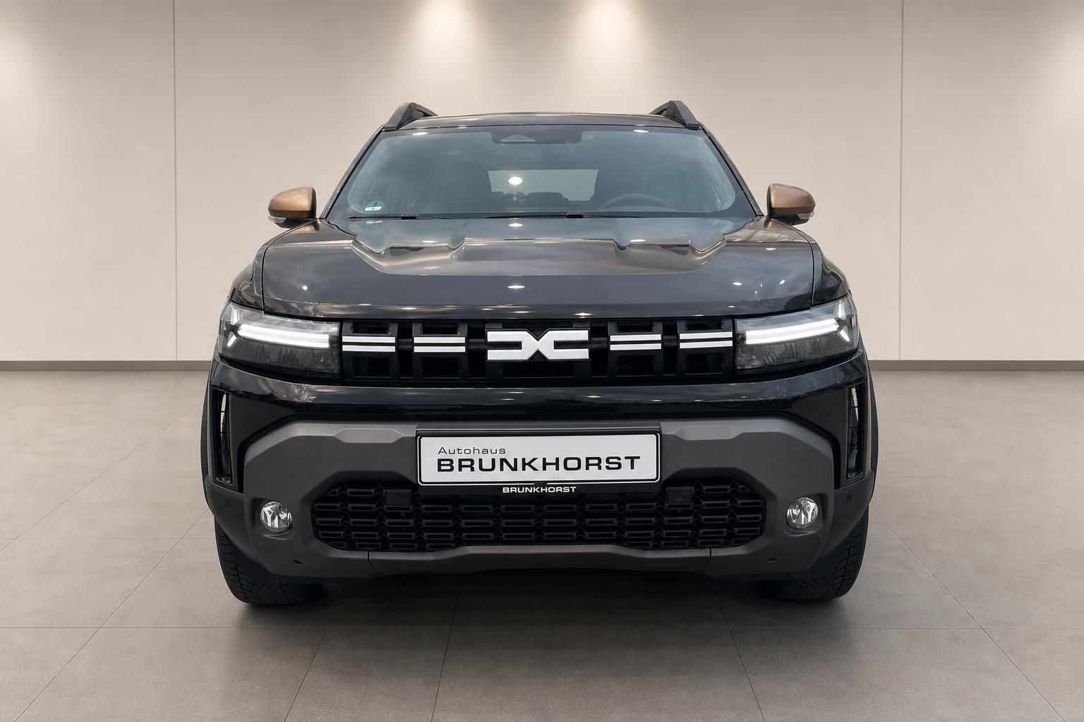 Dacia Duster schwarz Frontansicht mit LED-Scheinwerfern