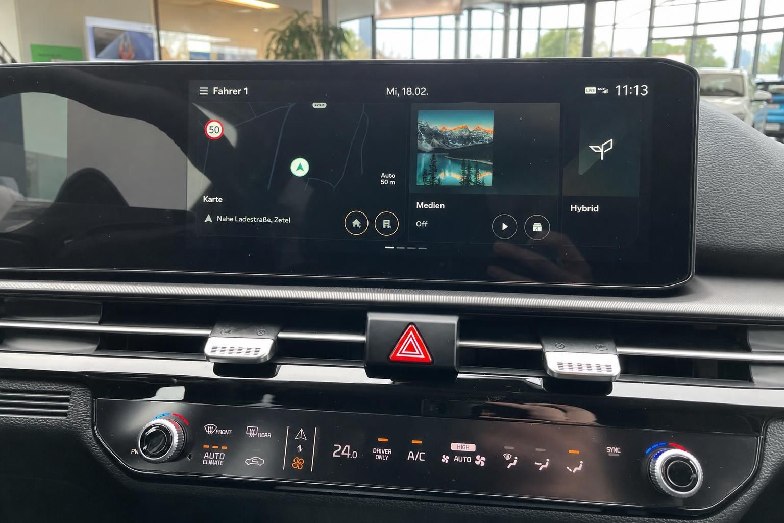 Kia Sportage Infotainment-Display mit Navigation und Klimabedienung