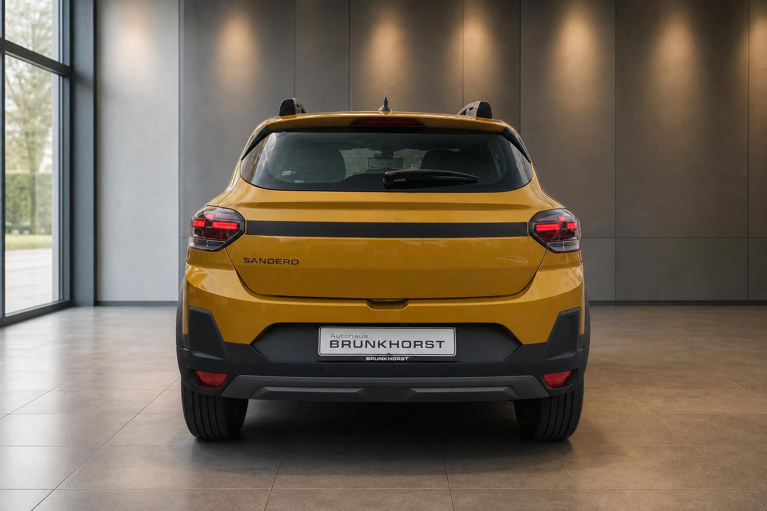 Dacia Sandero Stepway gelb Heckansicht im Autohaus Brunkhorst