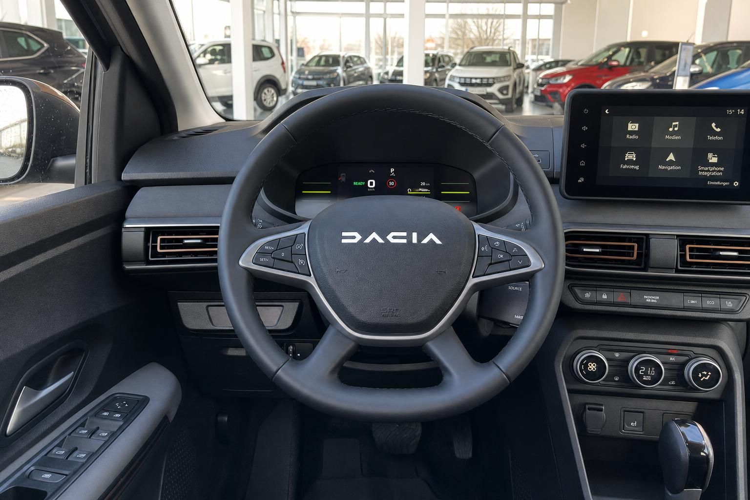 Dacia Innenraum mit Lenkrad, digitalem Cockpit und Touchscreen-Infotainmentsystem