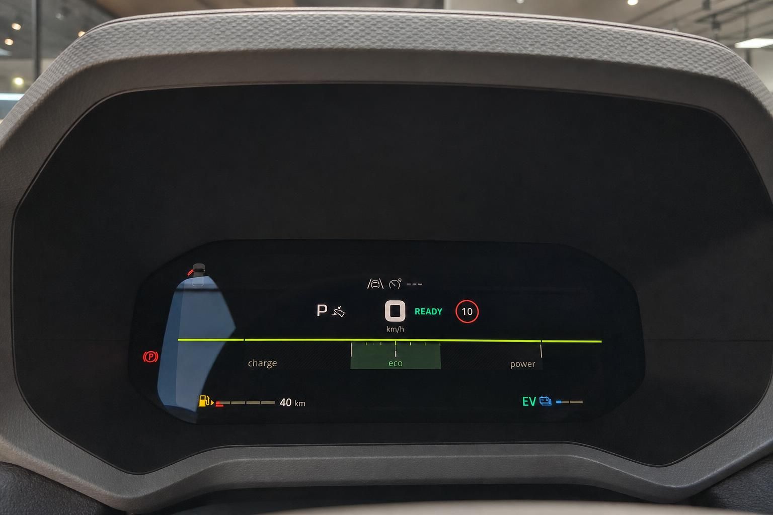 Digitales Tacho-Display eines Elektrofahrzeugs mit Reichweitenanzeige