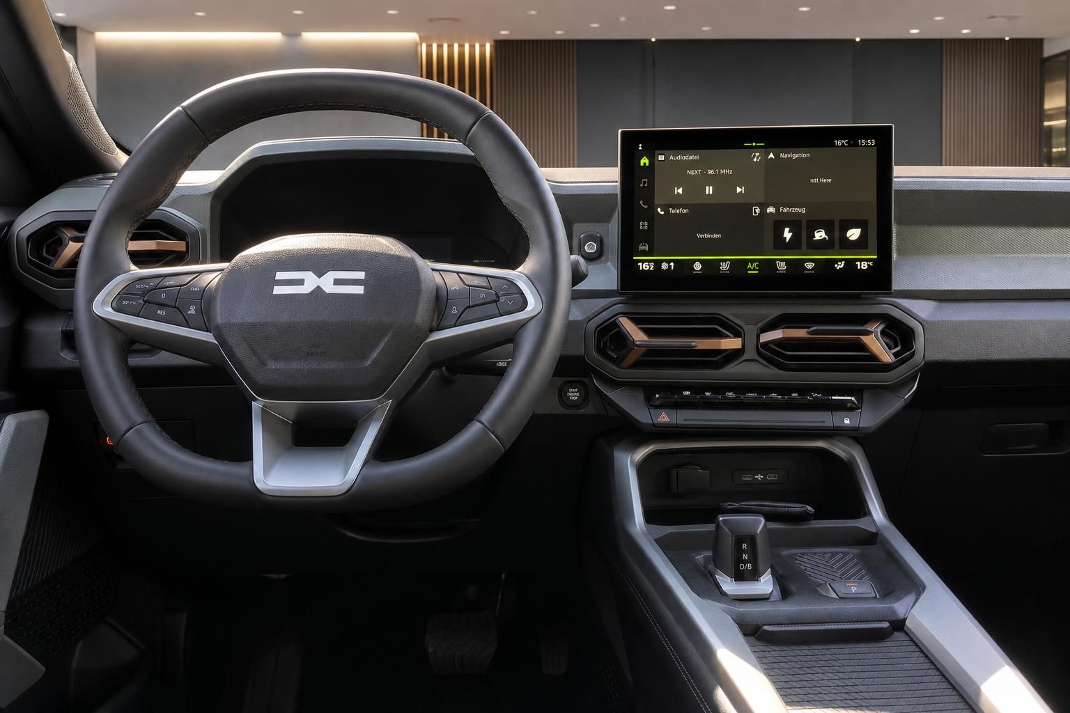 Cockpit mit Lenkrad und Infotainment-Display im Fahrzeuginnenraum