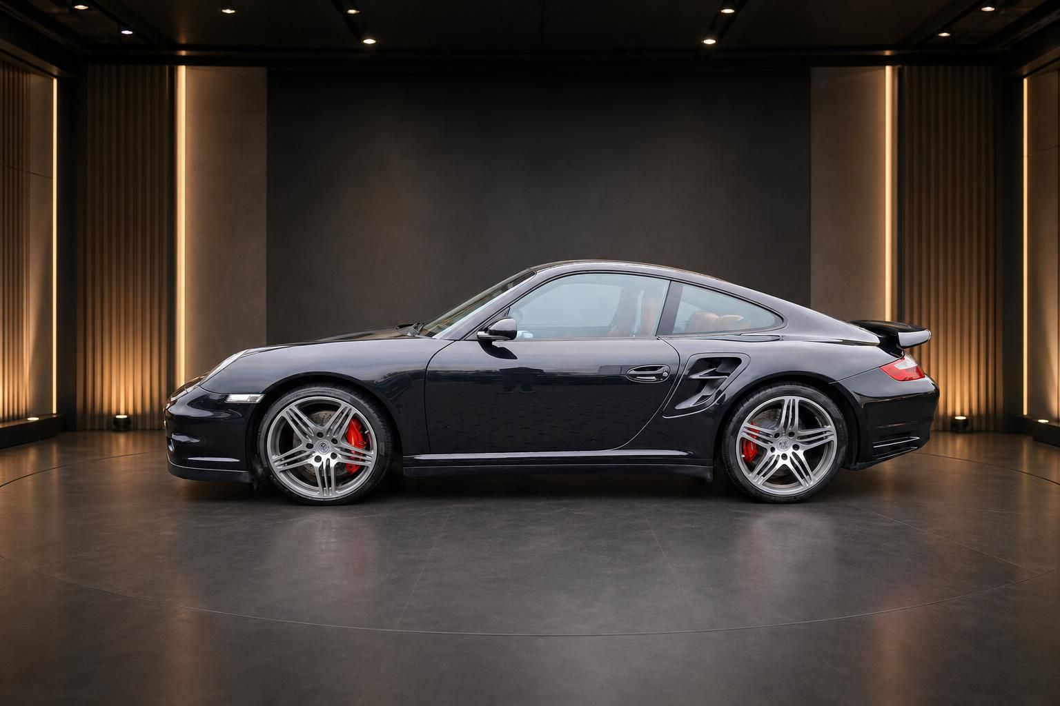 Porsche 911 Turbo schwarz Seitenansicht Profil mit Sportfelgen