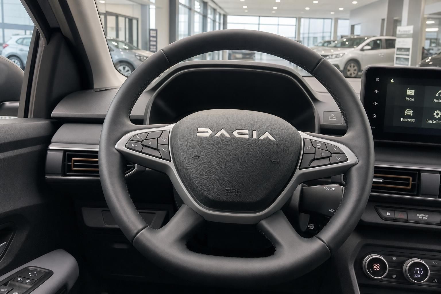 Dacia Lenkrad und Armaturenbrett schwarz mit Touchscreen Display Innenraum