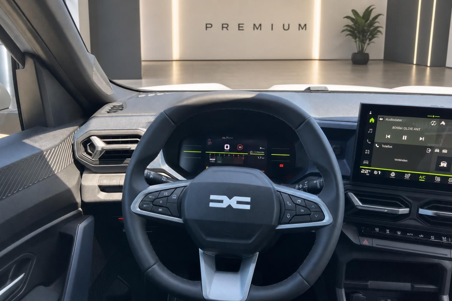 Cockpit mit Lenkrad und Digitaltacho im Fahrzeuginnenraum
