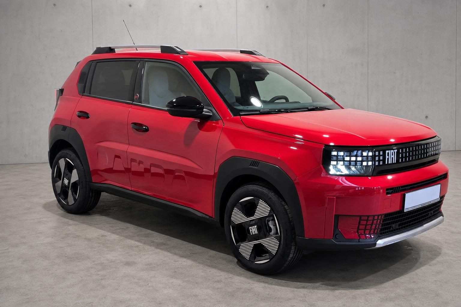 Fiat Panda rot, Seitenansicht vorne mit Leichtmetallfelgen