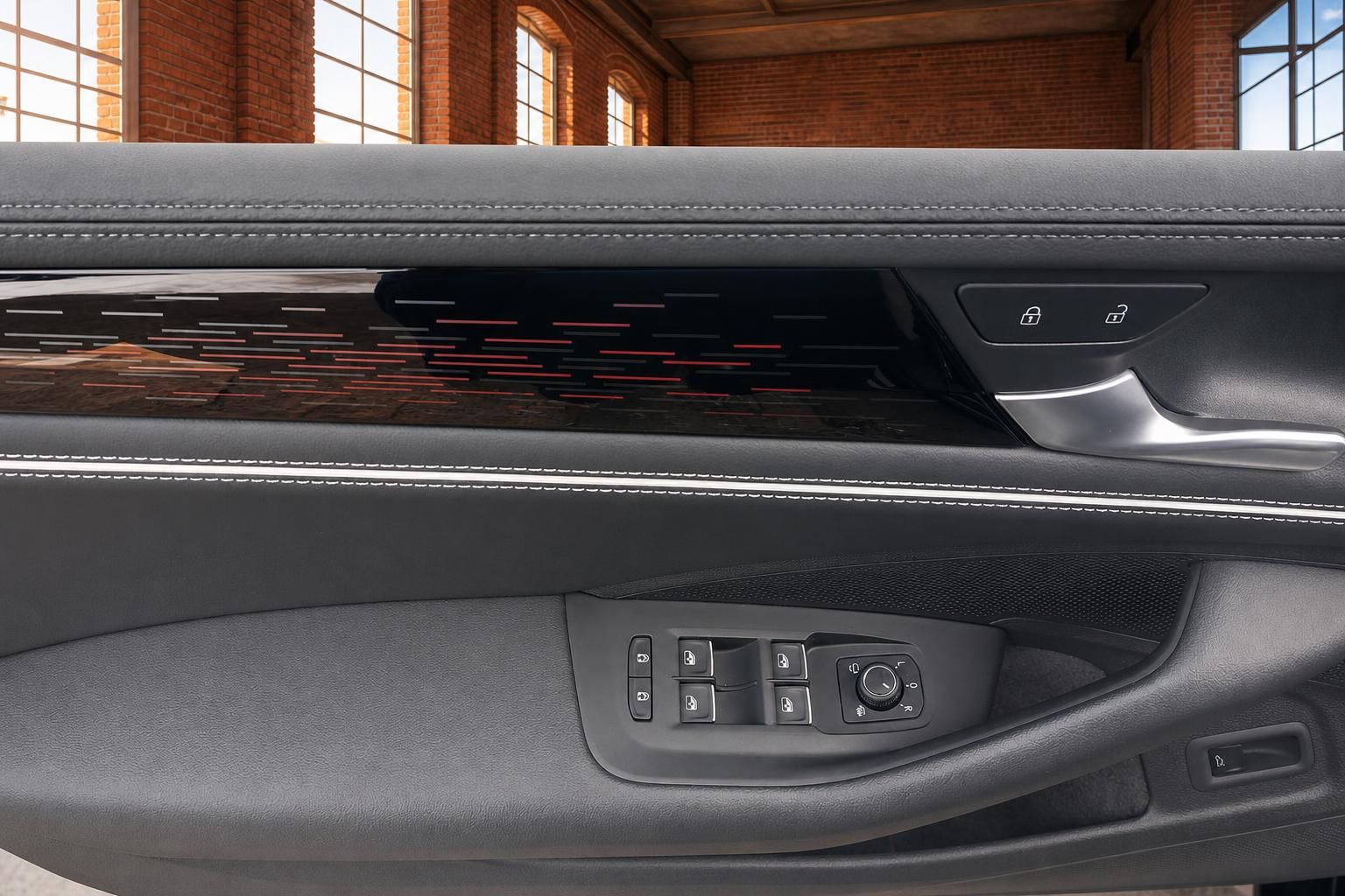Türverkleidung mit Fensterhebern im VW Passat Innenraum
