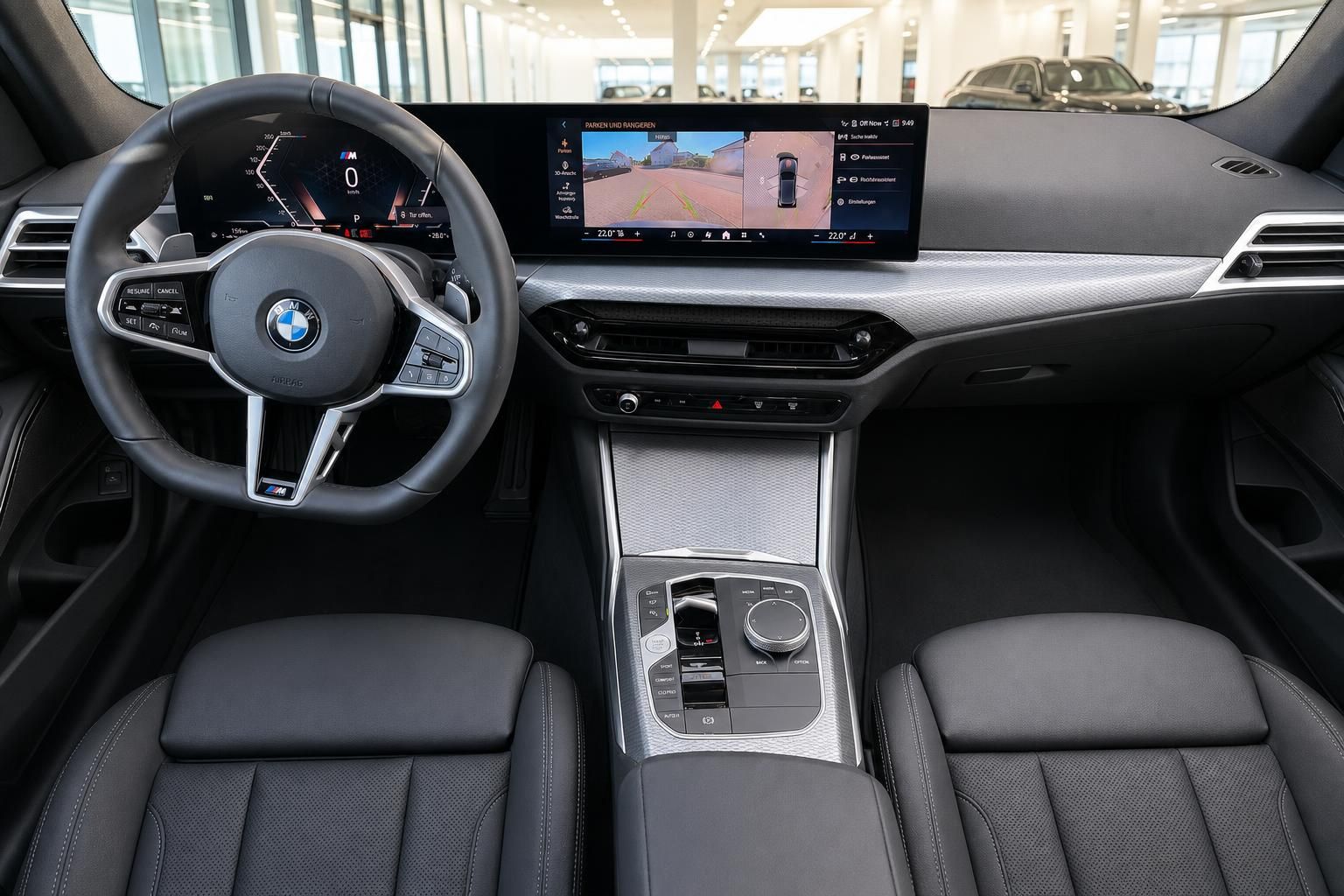 BMW Cockpit mit Lenkrad, Sitzen und Infotainment-Display