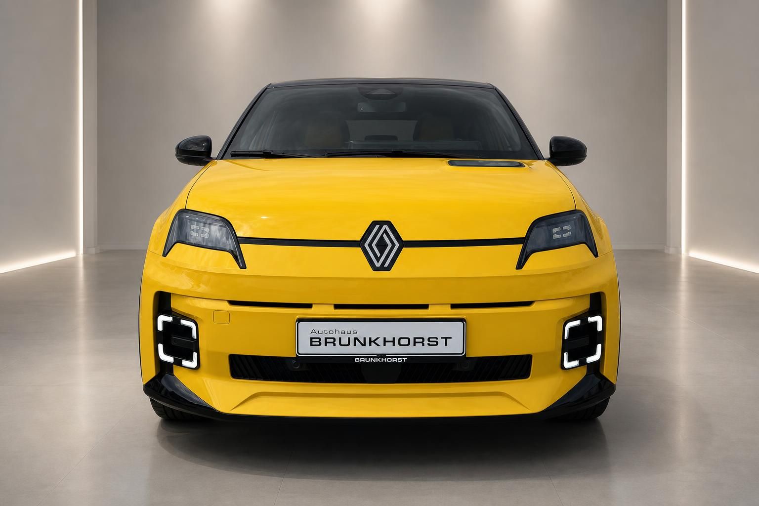 Renault 5 E-Tech Electric gelb Frontansicht mit LED-Tagfahrlicht im Studio