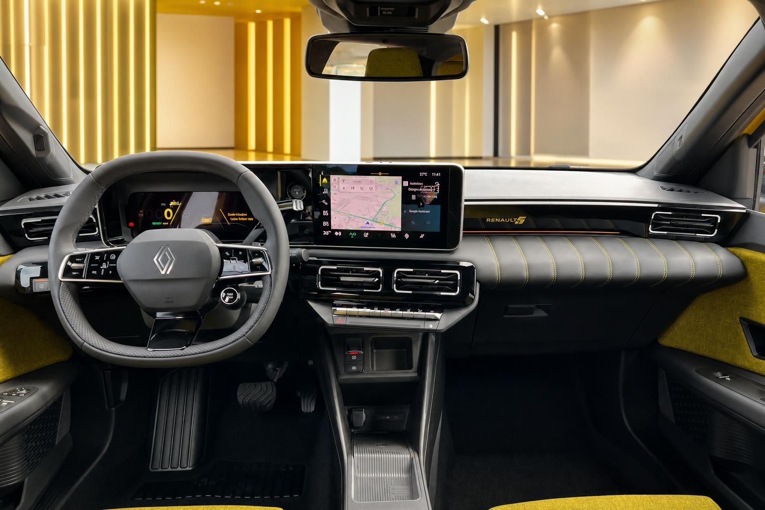 Renault 5 E-Tech Innenraum Cockpit mit Lenkrad und Touchscreen-Navigation