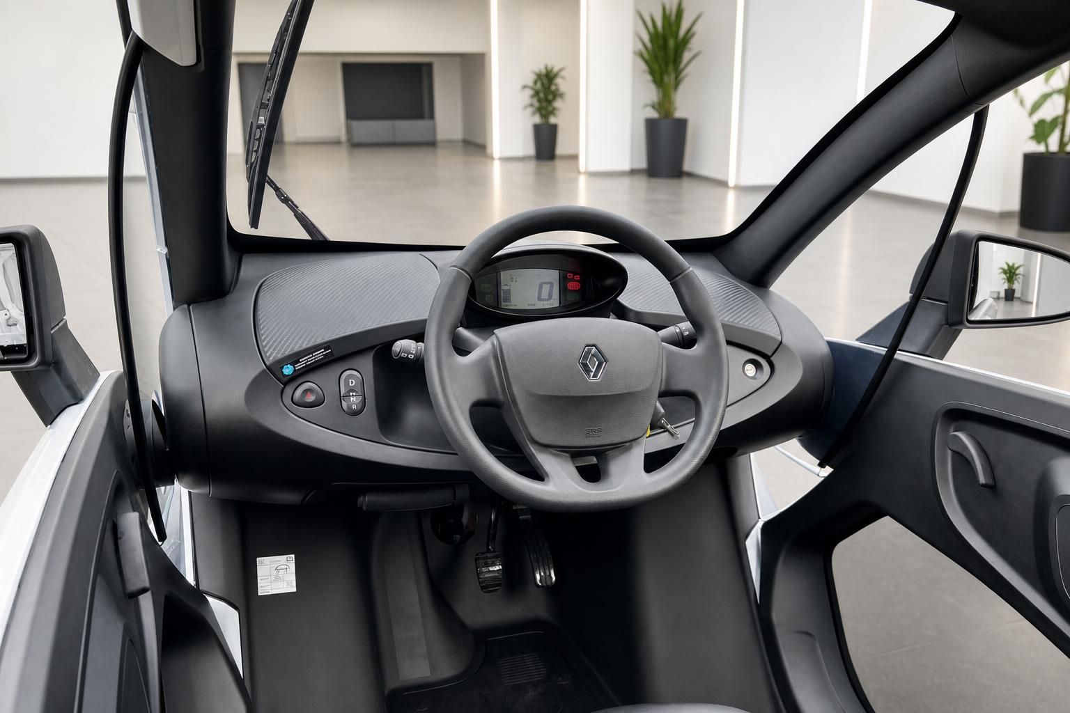 Renault Twizy Innenraum Cockpit Lenkrad Armaturenbrett grauer Fahrersitz offene Türen