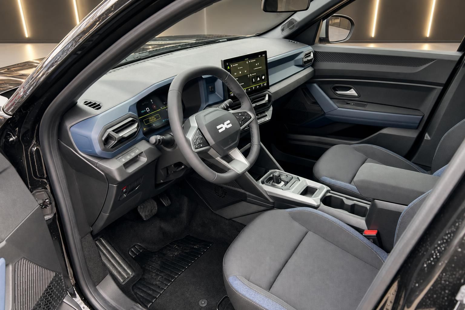 Dacia Bigster Innenraum mit grau-schwarzer Ausstattung und digitalem Cockpit