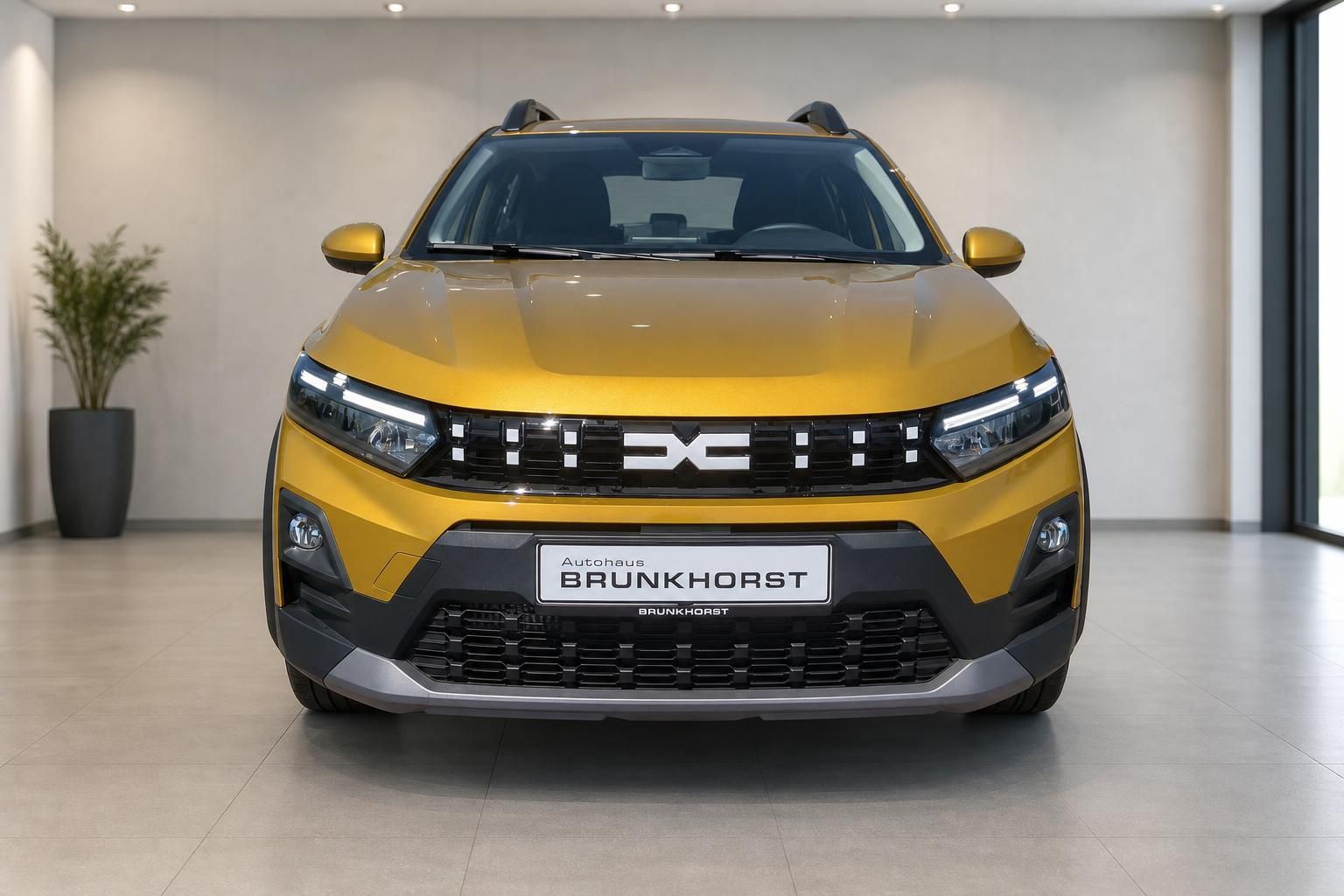 Dacia Sandero Stepway gelb, Frontansicht im Autohaus Brunkhorst