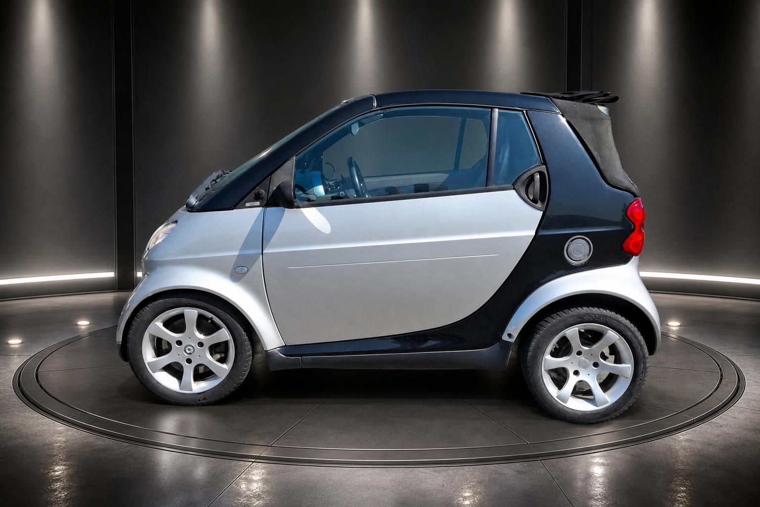 Smart Fortwo Cabrio silber-schwarz, Seitenansicht Fahrerseite