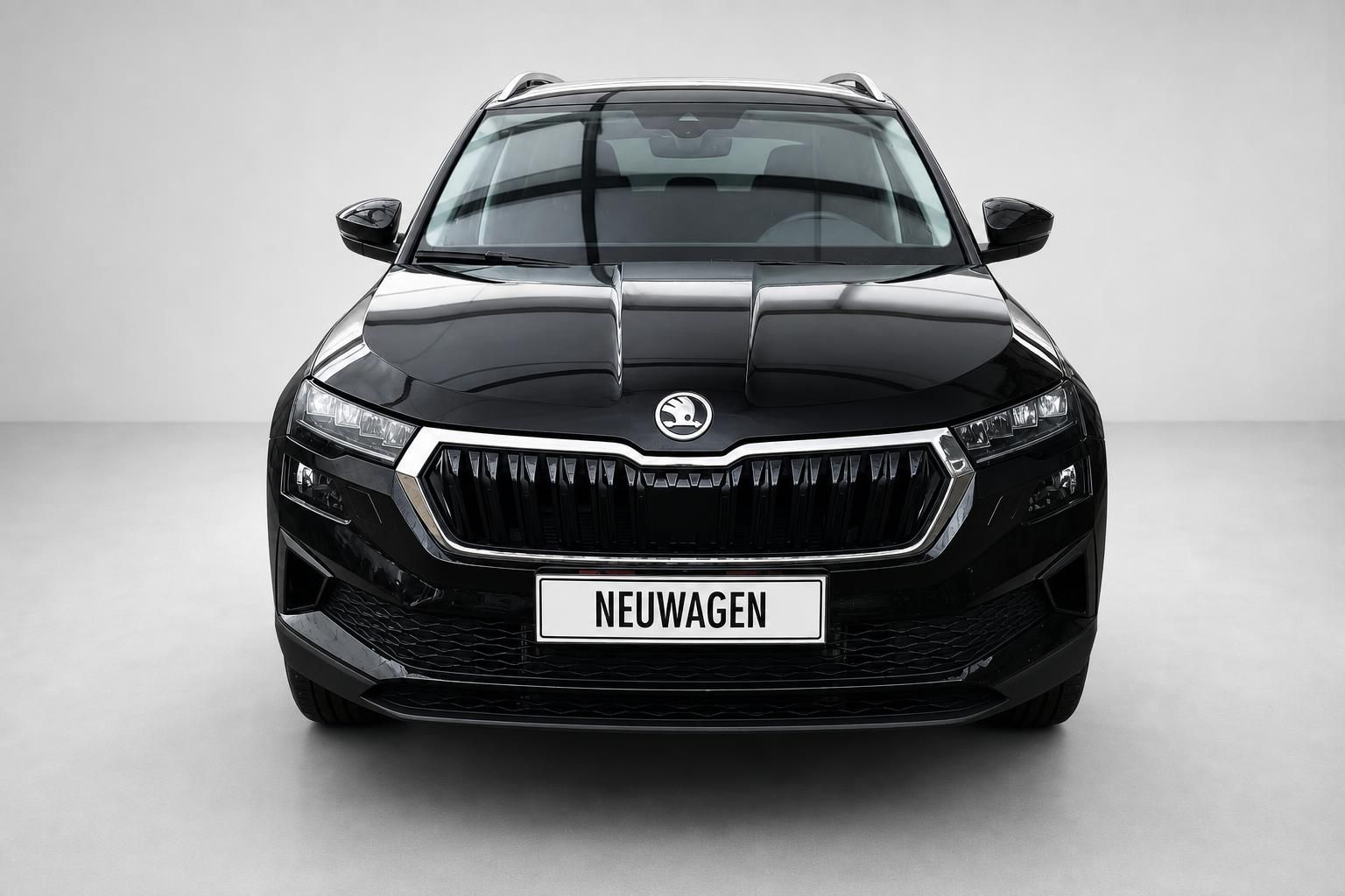 Skoda Karoq schwarz Frontansicht SUV Kuehlergrill Detail