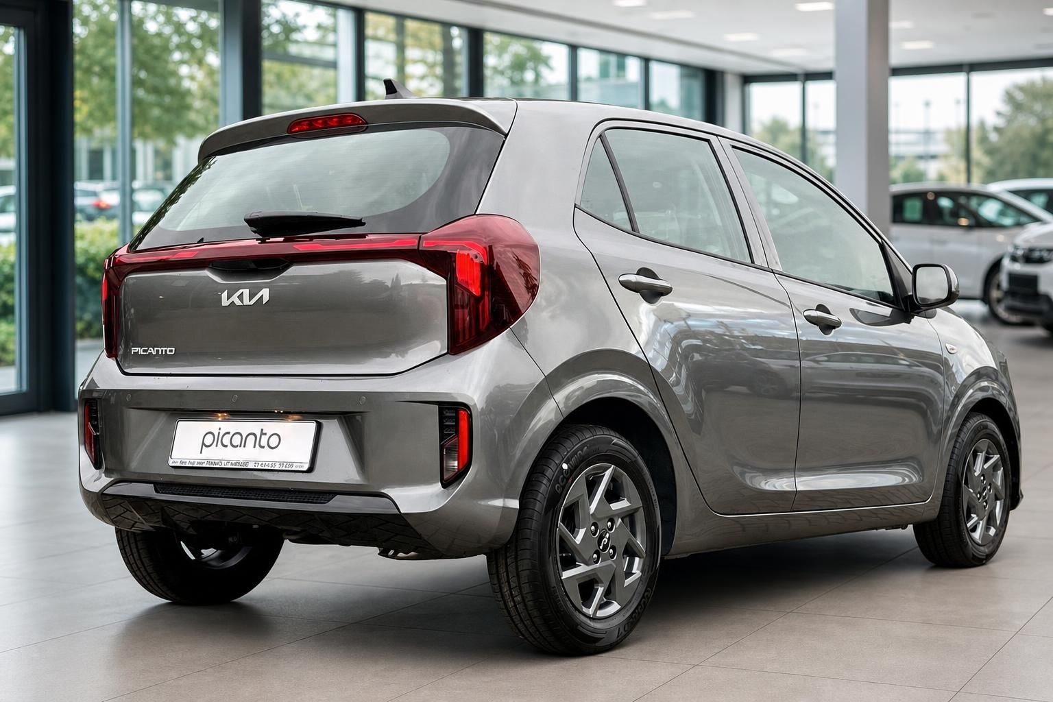 Kia Picanto grau, Heck schräg seitlich fotografiert