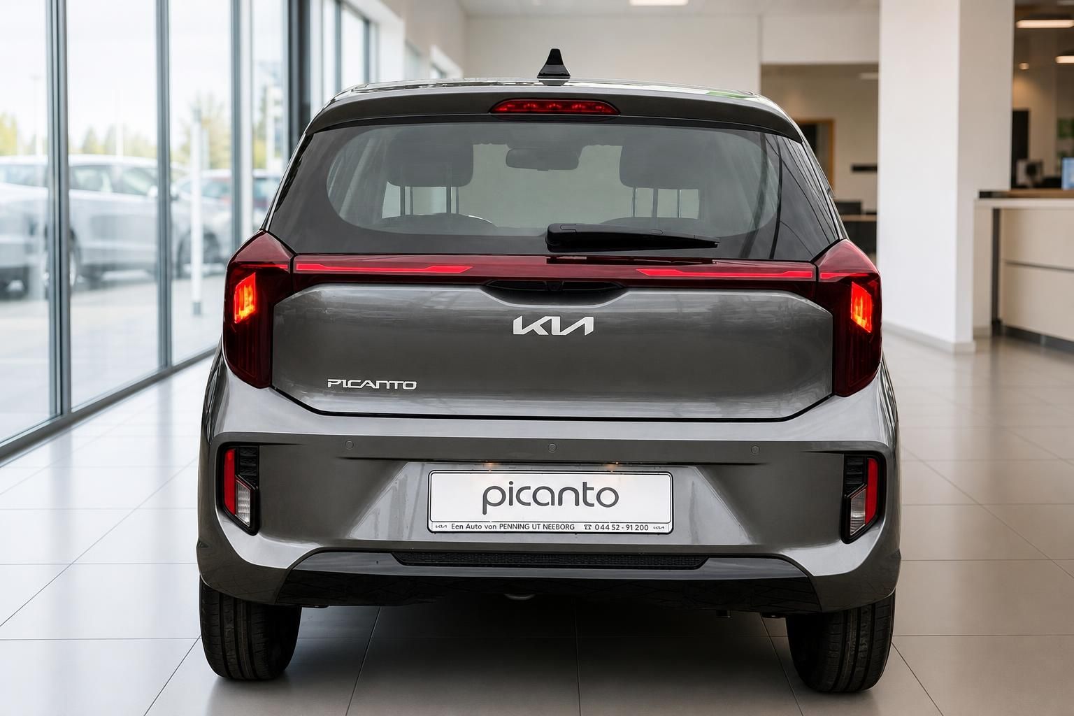 Kia Picanto grau, Heckansicht mit Kennzeichenhalter