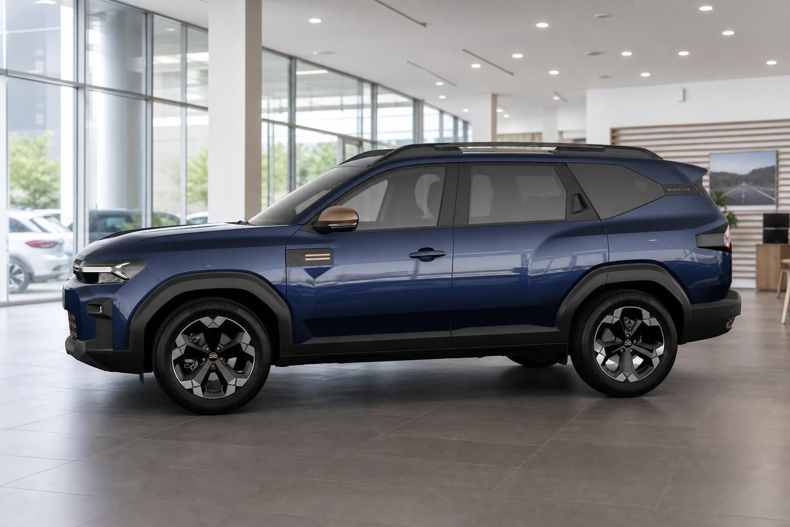 Dacia Bigster in Blau Seitenansicht im Autohaus Showroom
