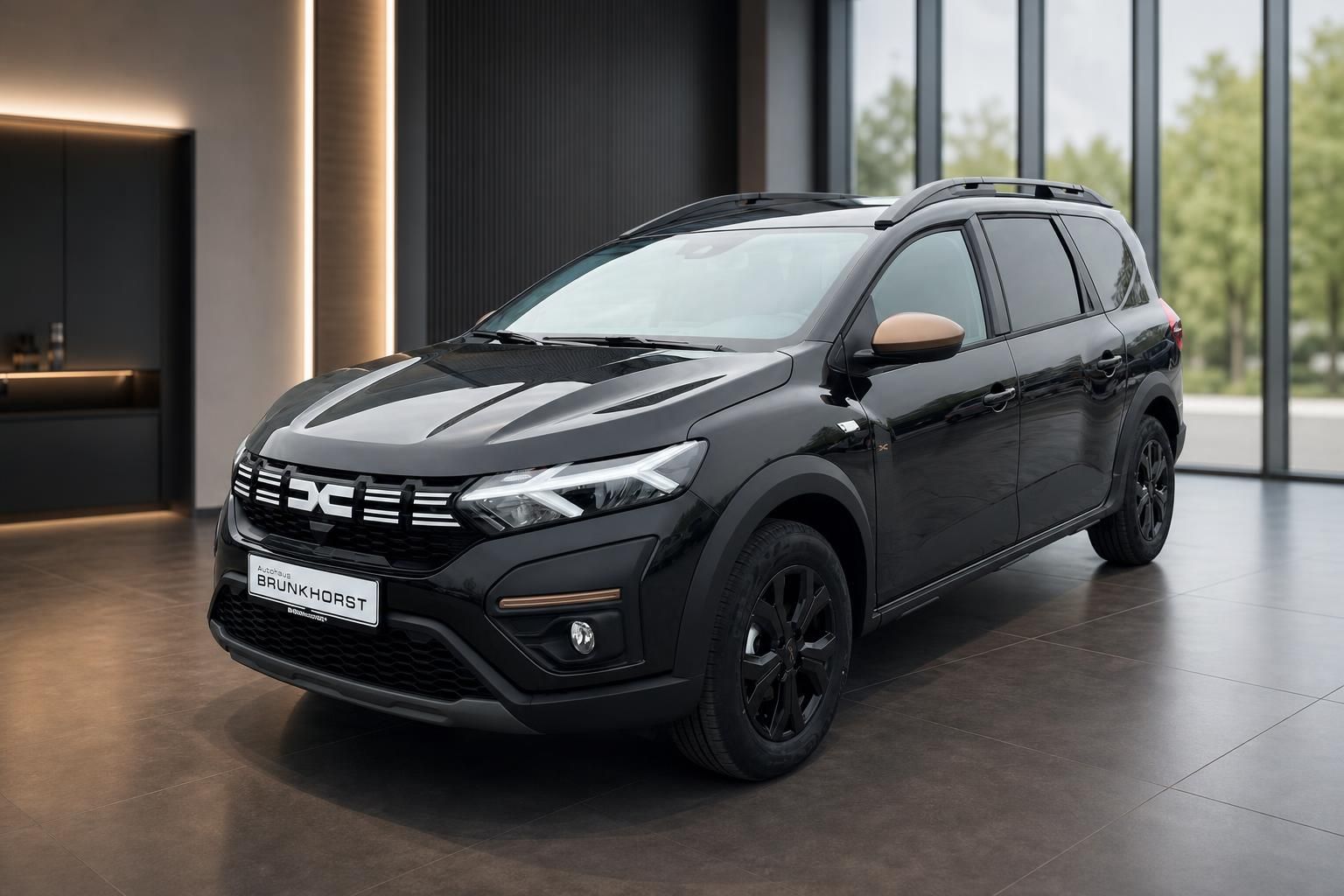 Dacia Jogger schwarz Seitenansicht im Autohaus Brunkhorst Showroom