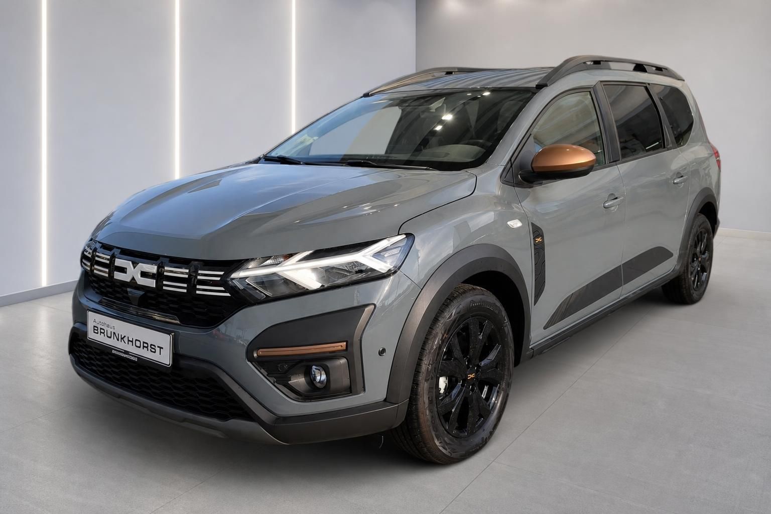 Dacia Jogger Extreme Seitenansicht in Grau mit Schwarzfelgen