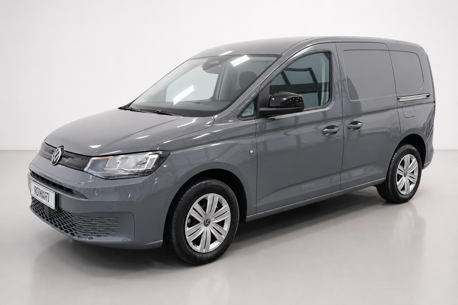 VW Caddy Kastenwagen grau, Frontansicht schräg