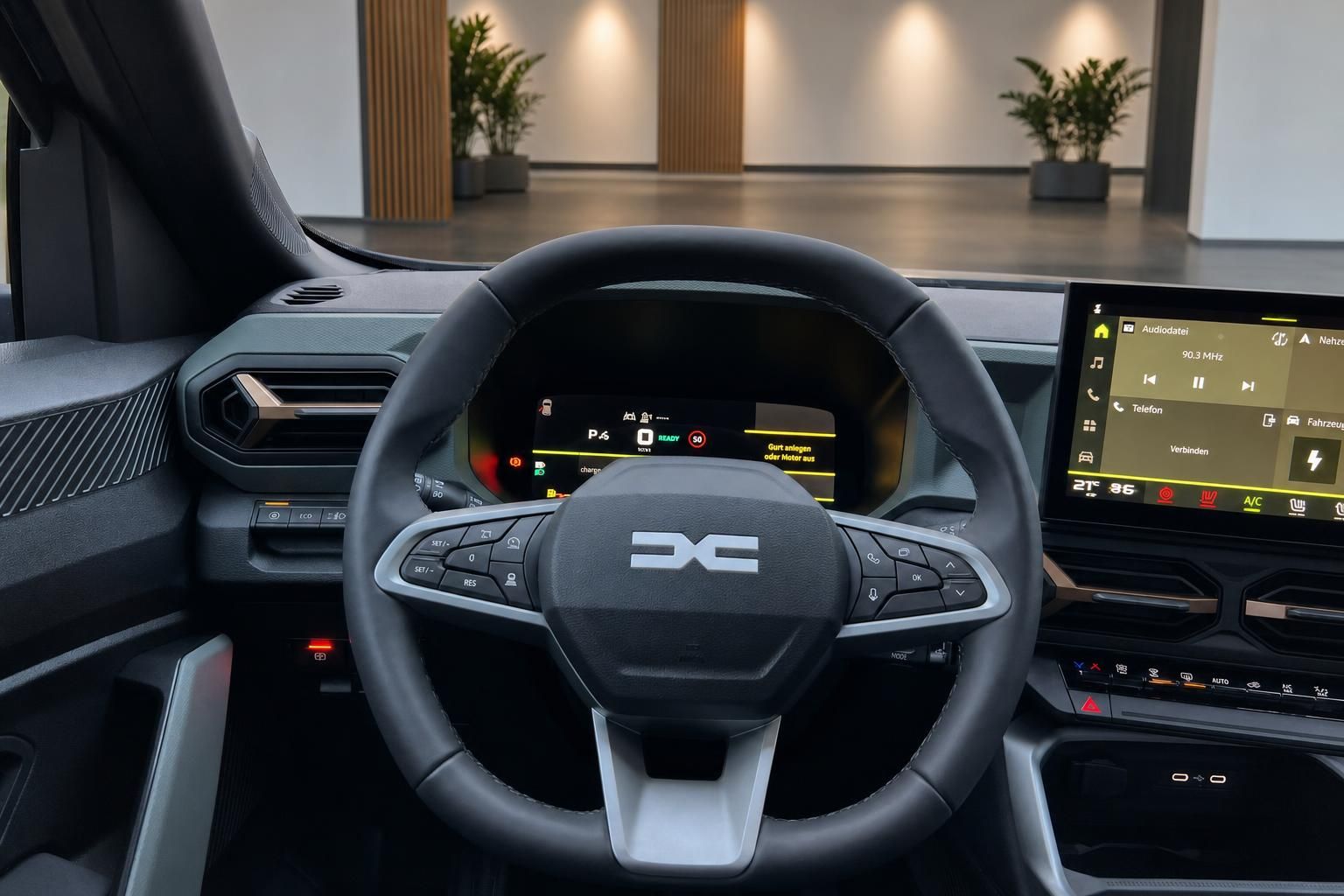 Dacia Bigster Cockpit - digitales Kombiinstrument und Infotainment-Display mit Dacia Logo am Lenkrad