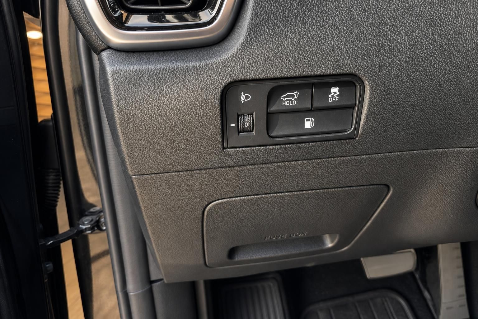 Kia Bedienelemente im Innenraum mit Schalterleiste für Fahrassistenzsysteme