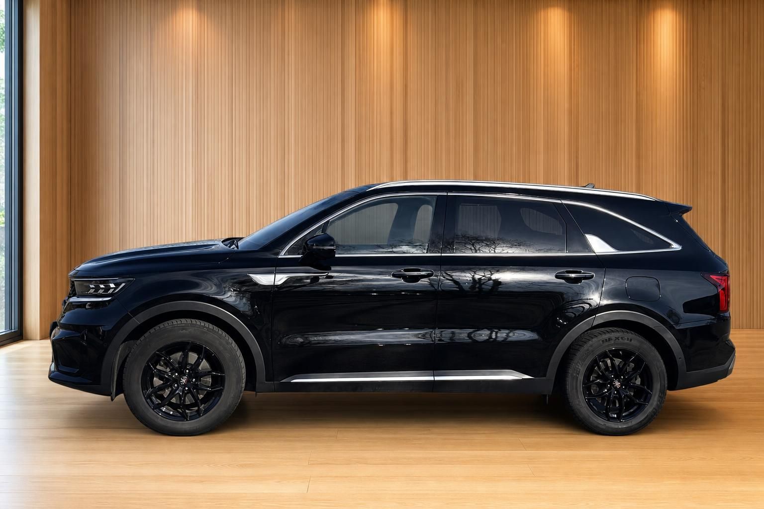 Kia Sorento SUV schwarz Seitenansicht – eleganter Plug-in-Hybrid mit schwarzen Leichtmetallfelgen