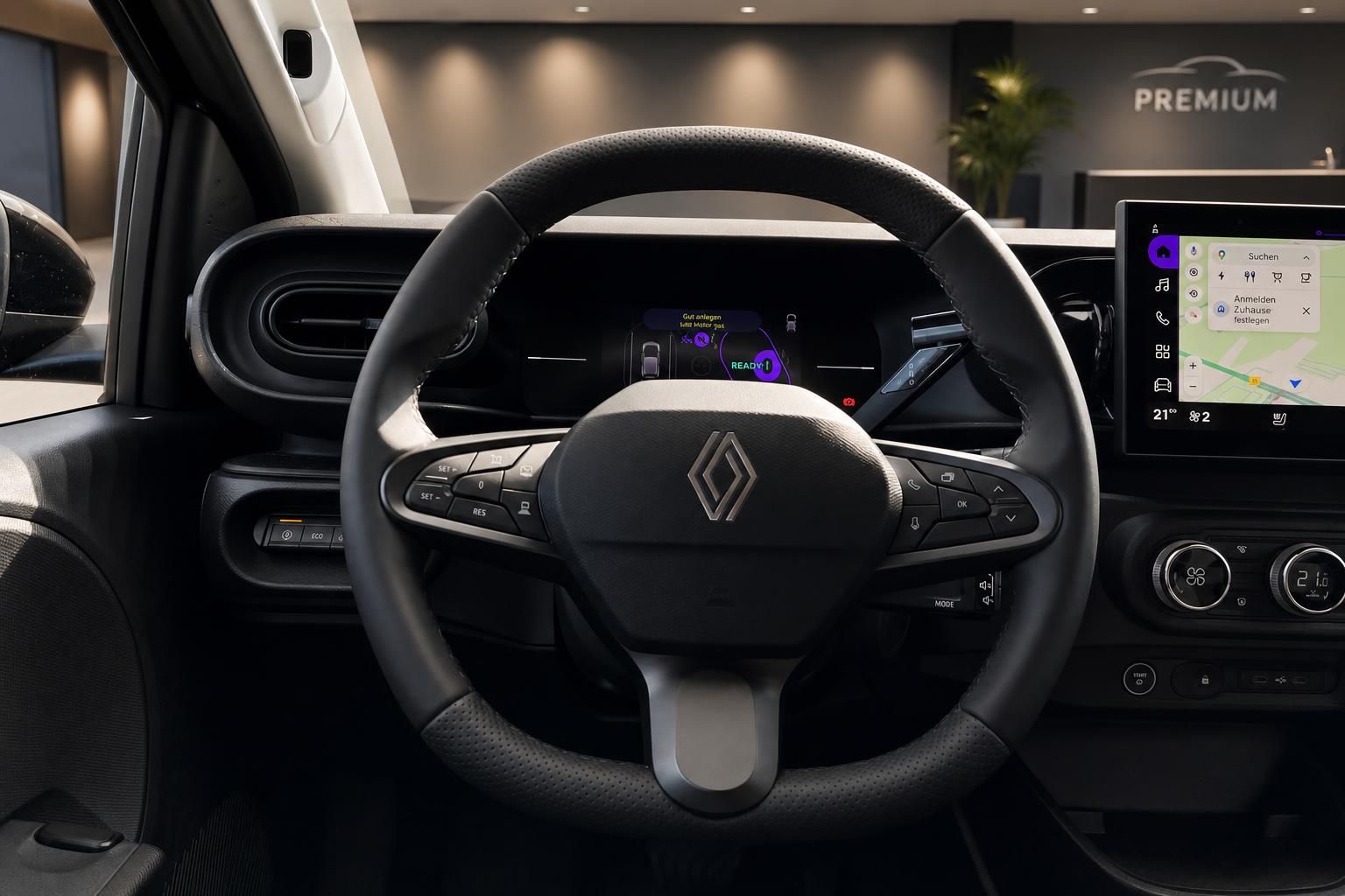 Renault Innenraum mit Lenkrad, digitalem Cockpit und Infotainment-Display