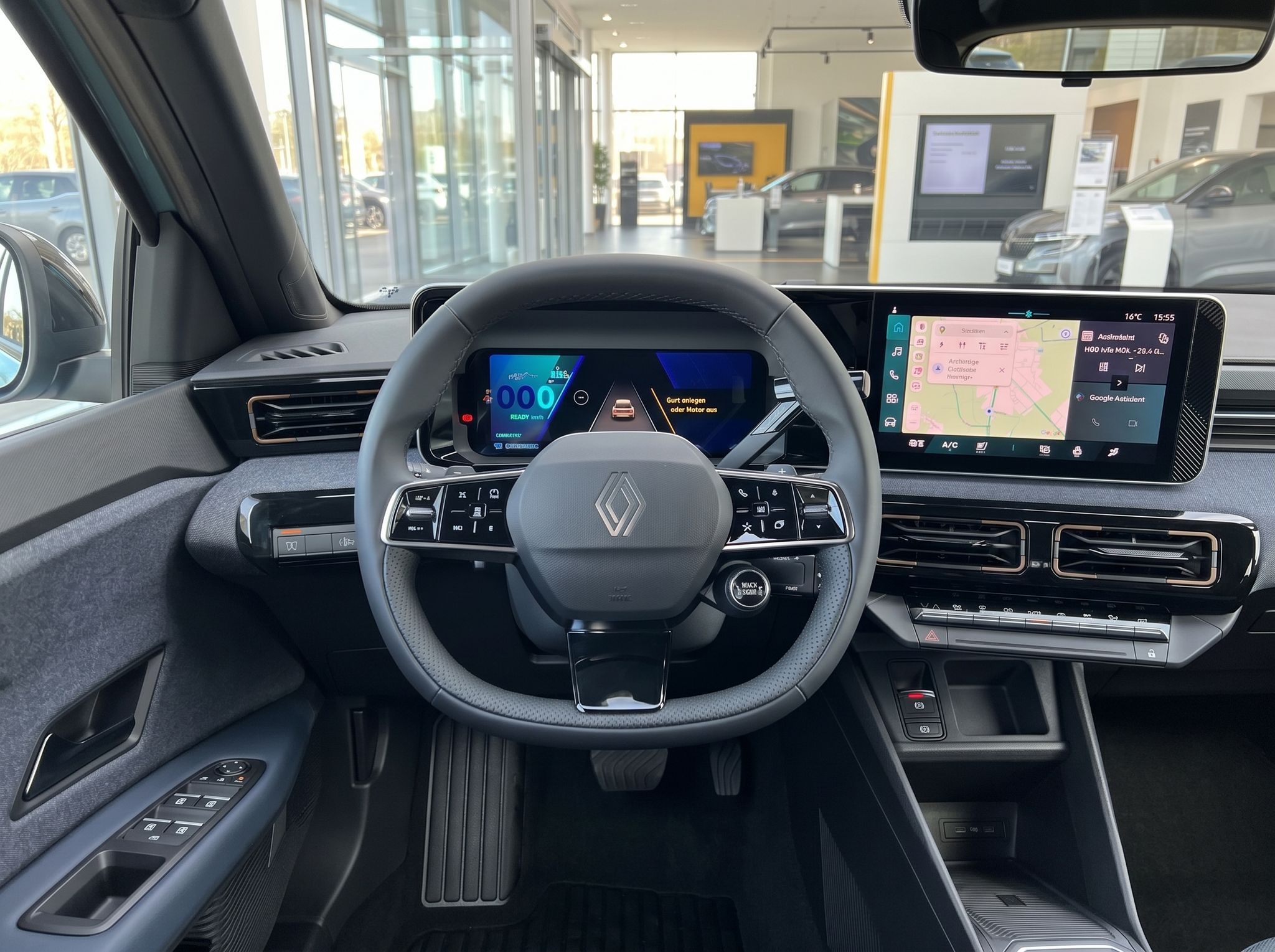 Renault Fahrerplatz mit Lenkrad, digitalem Display und Touchscreen - Cockpit Ansicht