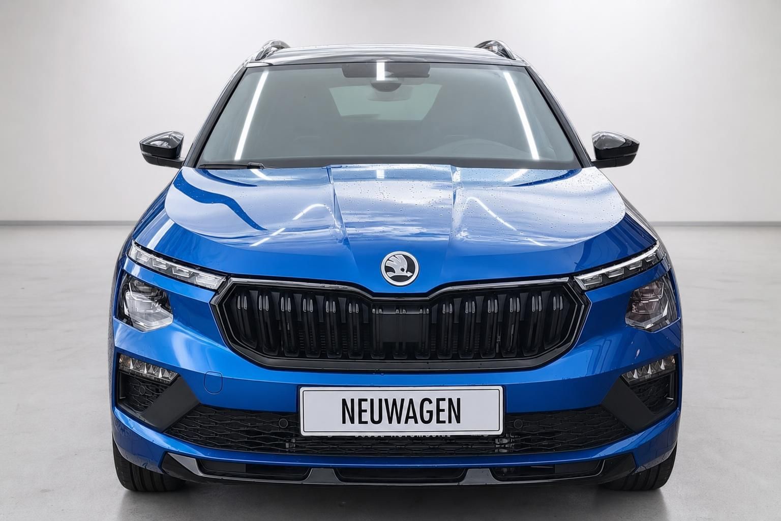 Skoda Kamiq blau Frontansicht mit Kuehlergrill Neuwagen