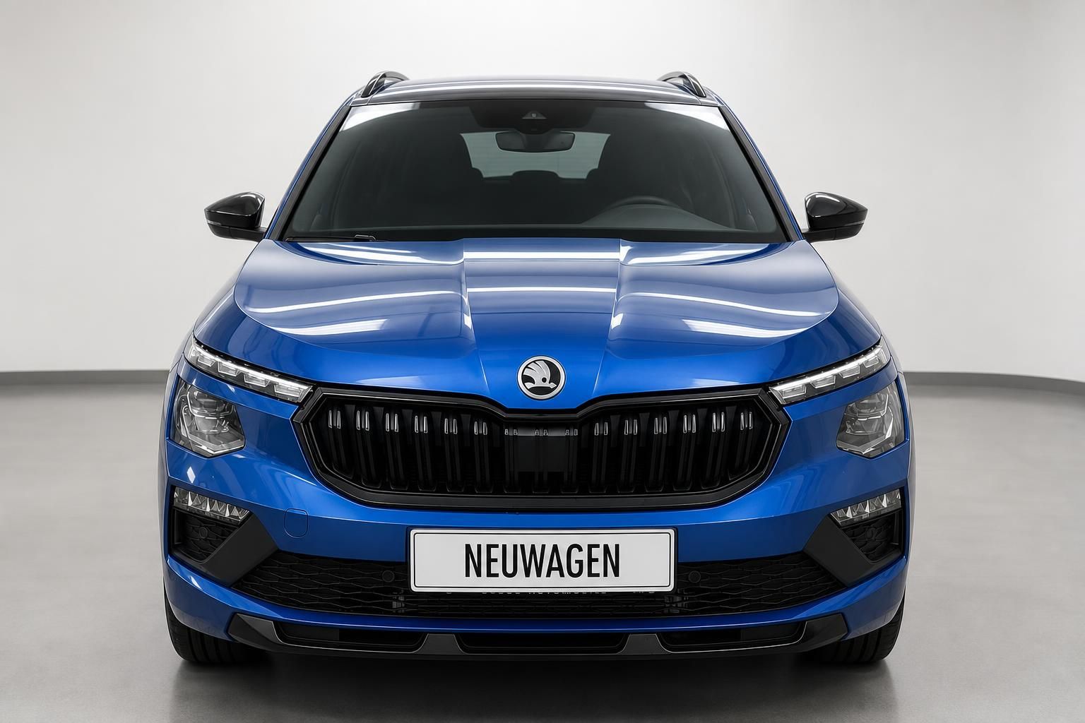 Skoda Kamiq blau Frontansicht mit Kuehlergrill im Studio